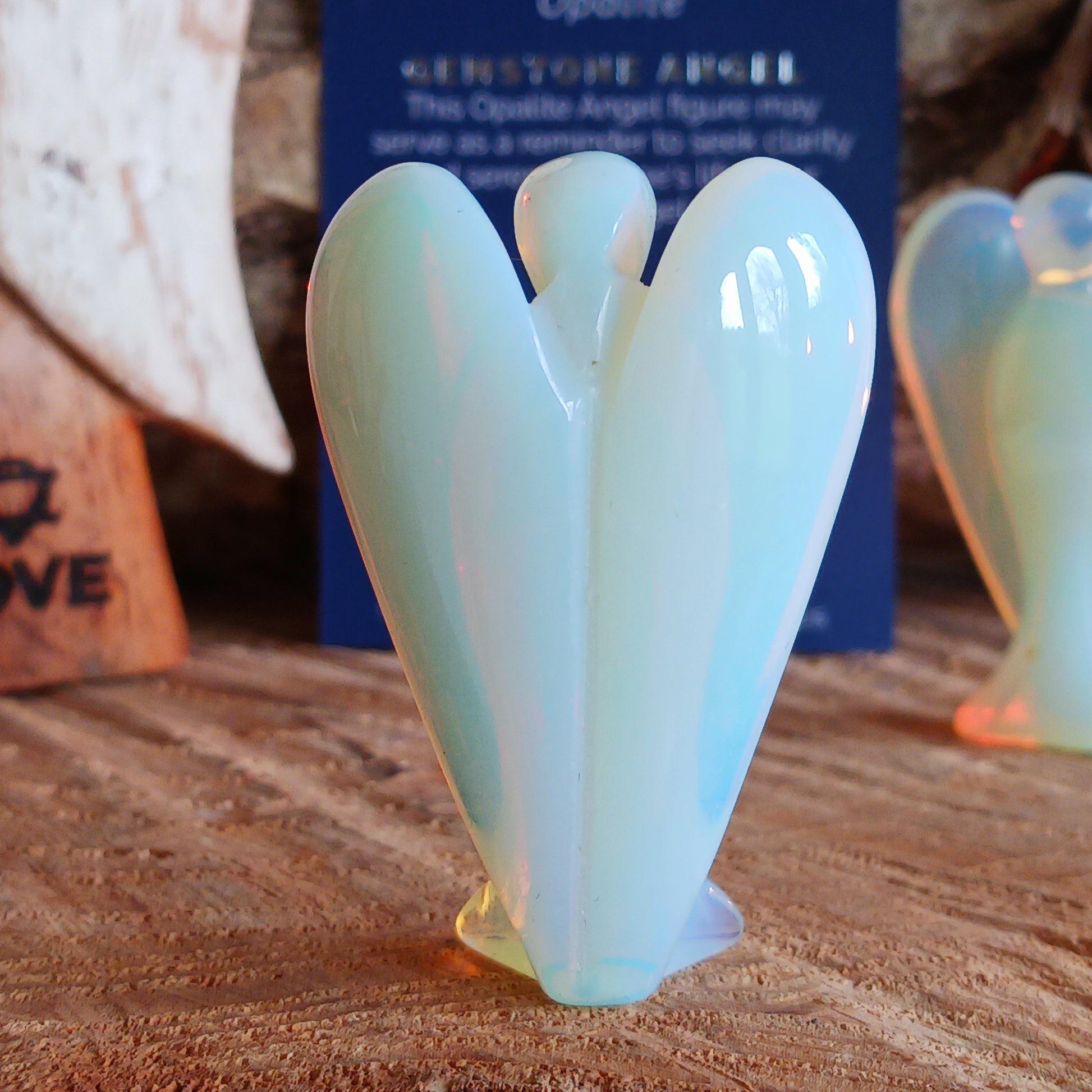 These beautiful angels are hand carved from Opalite. Opalite is treasured for its array of metaphysical properties, including its calming influence, capacity to enhance communication, role in spiritual growth, and potential to boost intuition.