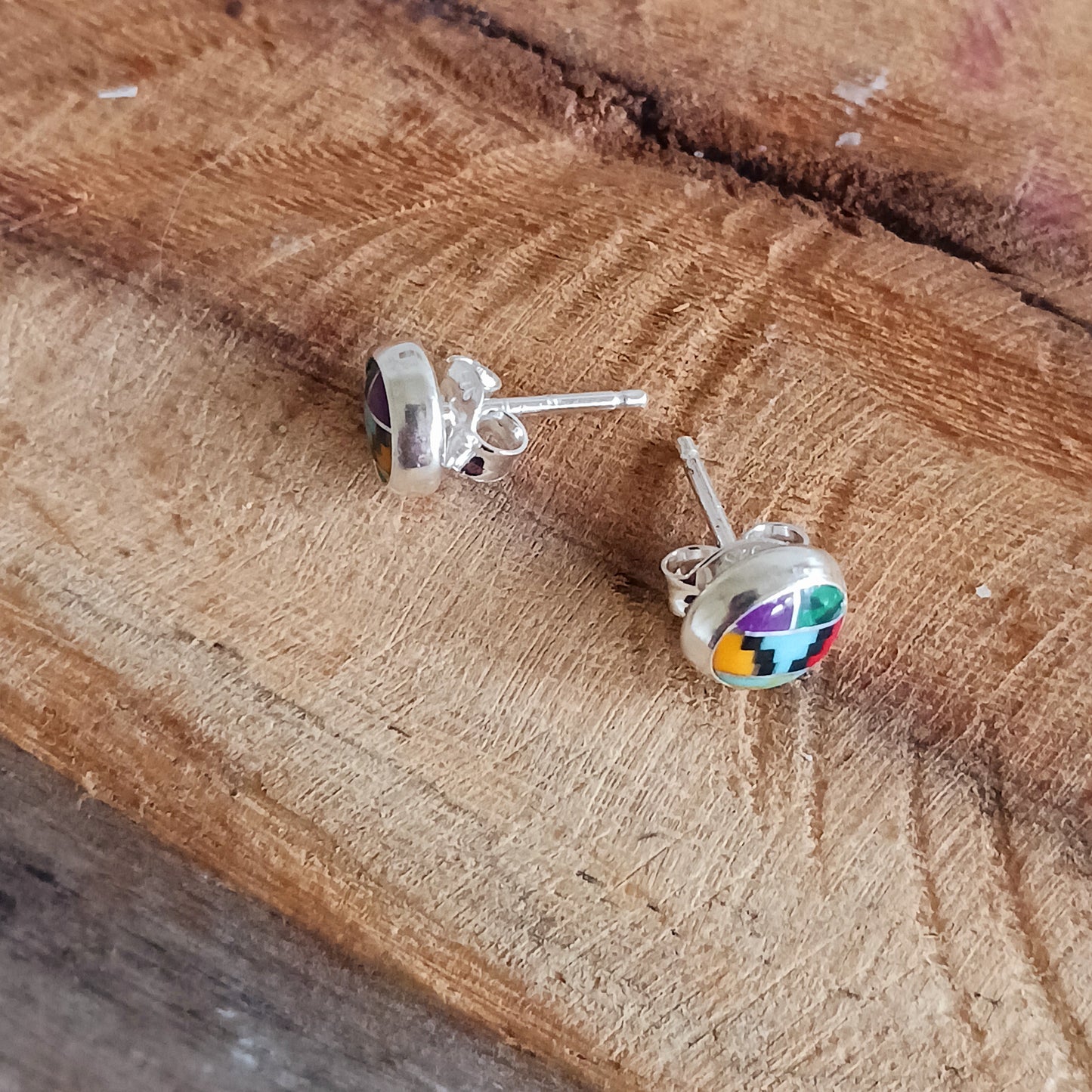 These little earrings are decorated in a colourful Aztec motif.  These handmade stud earrings are unique. Each earring is a miniature work of art, with the intricate design and colours carefully handcrafted.