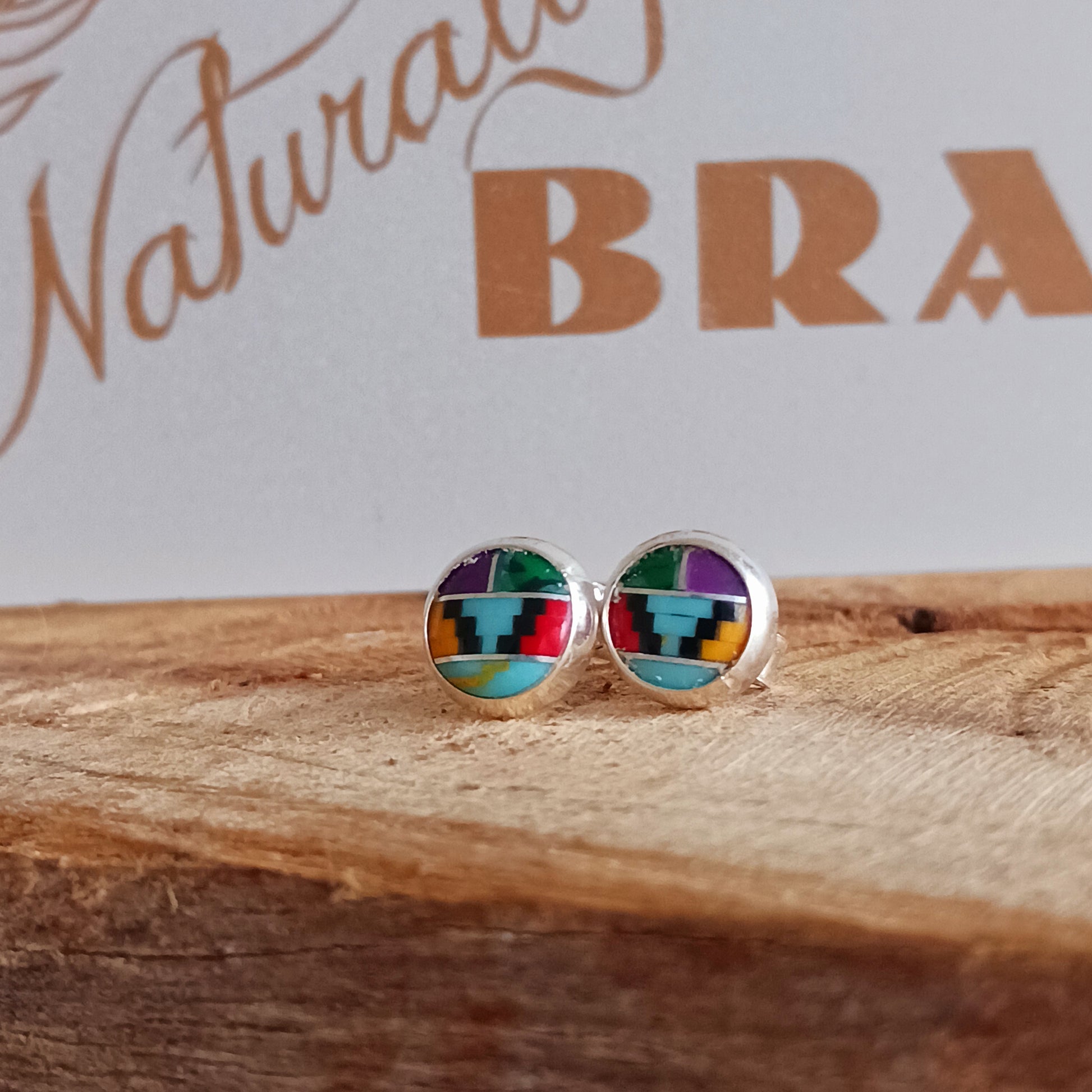 These little earrings are decorated in a colourful Aztec motif.  These handmade stud earrings are unique. Each earring is a miniature work of art, with the intricate design and colours carefully handcrafted.