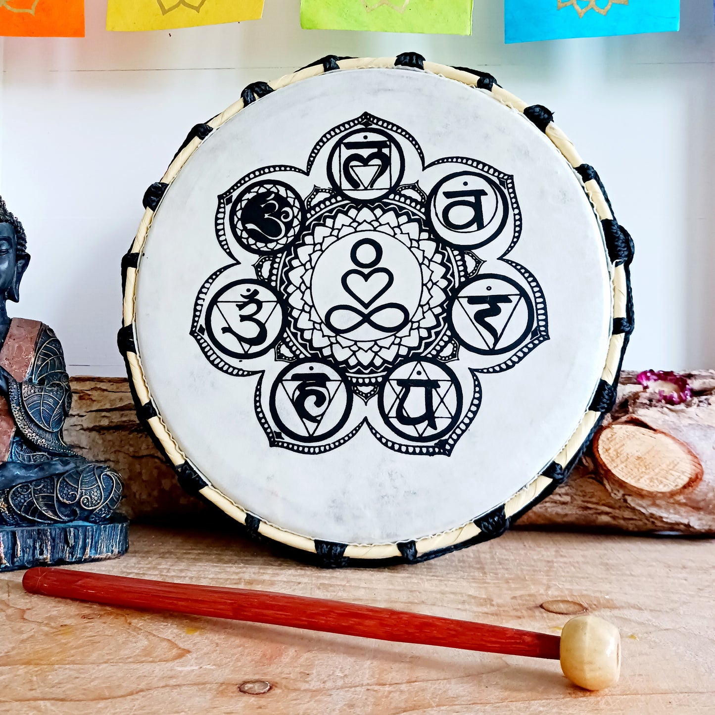 This Chakra Shamanic Drum is wonder that harmonises sight and sound. This captivating drum, complete with one stick, features a mesmerising Chakra design, inviting spiritual balance and tranquillity into your musical collection.