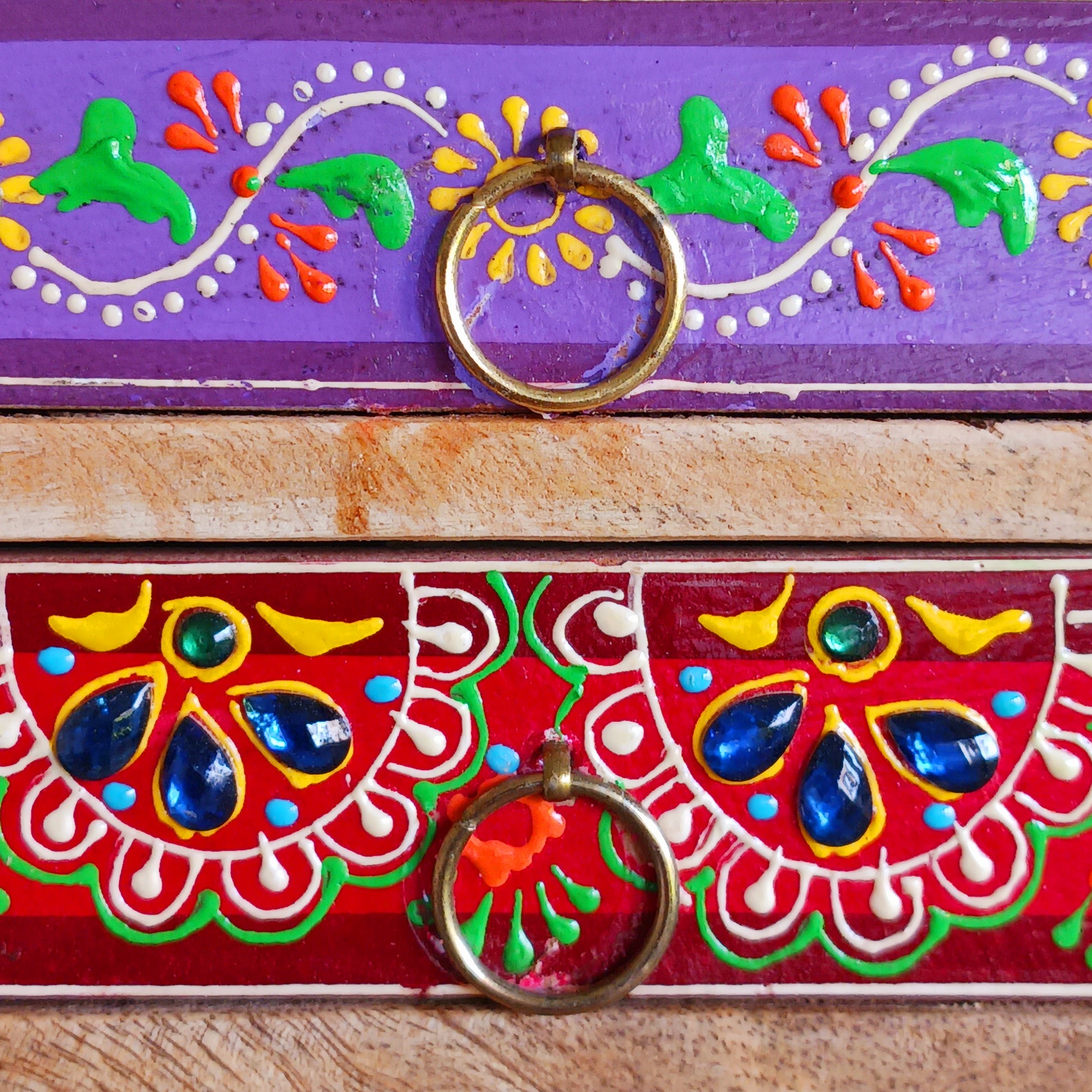 The Hindi word 'Sankalaka' is translated as 'eclectic'. The random applicaton of skillfully painted drawer panels results in this beautiful, eclectic, unique 6-drawer chest. Each panel is hand painted to perfection by highly skilled artisans. A beautiful addition to any home.