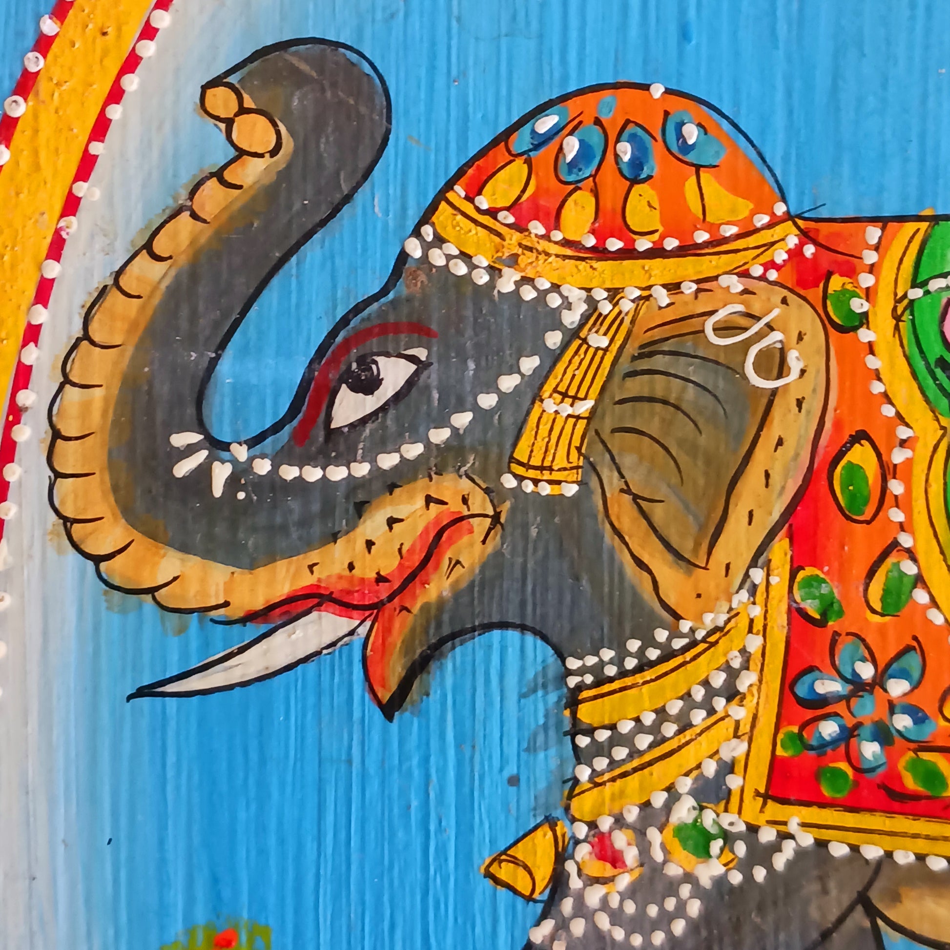 This stunning large Indian jewellery box has been hand painted to perfection in fresh spring-like colours of pastel blue, primrose yellow, pale pink and new season green.&nbsp; The elephant on the lid is in full ceremonial regalia and oval framed in yellow. It comprises a single drawer and top compartment opened by discreet round knobs.  A beautiful addition to any home.