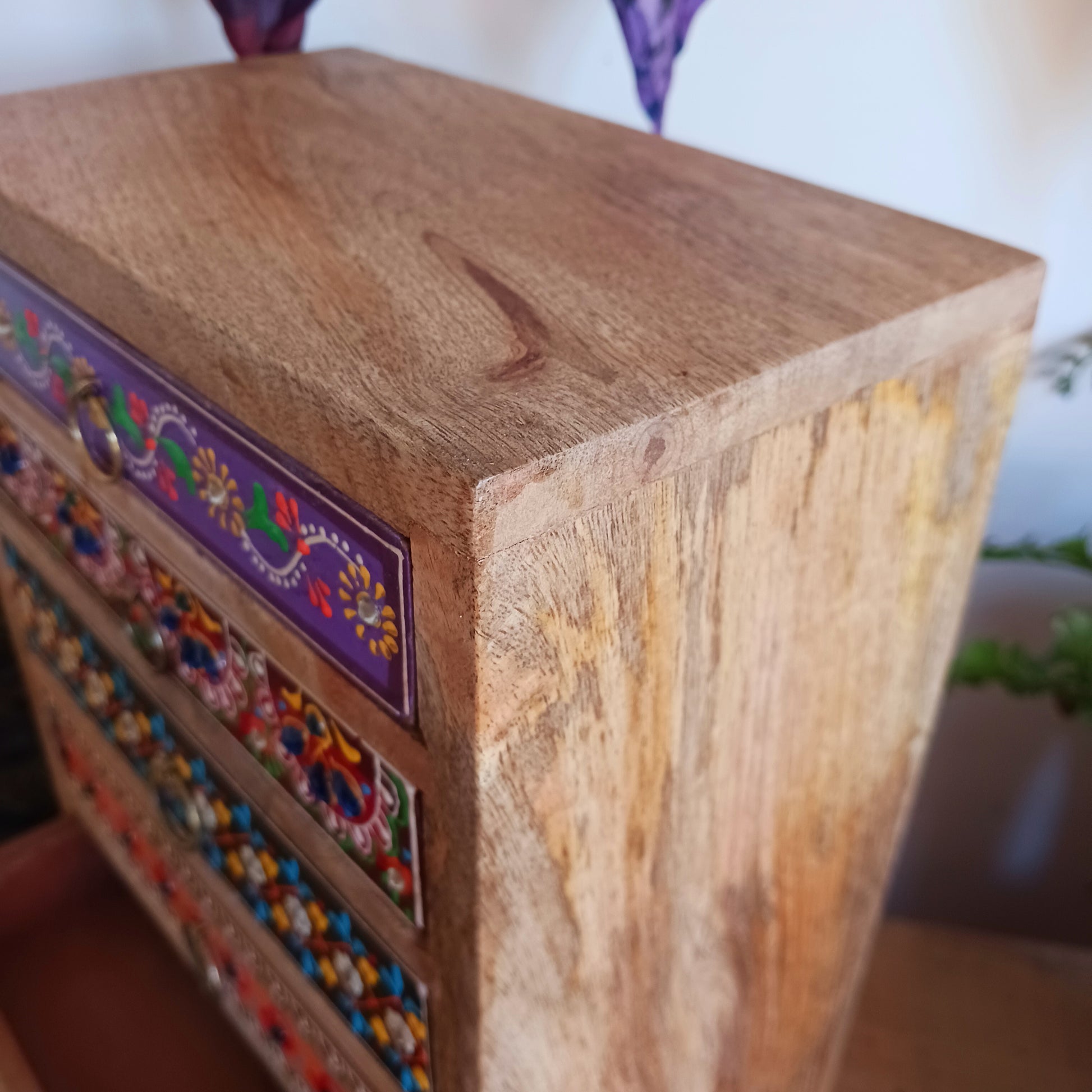 The Hindi word 'Sankalaka' is translated as 'eclectic'. The random applicaton of skillfully painted drawer panels results in this beautiful, eclectic, unique 6-drawer chest. Each panel is hand painted to perfection by highly skilled artisans. A beautiful addition to any home.