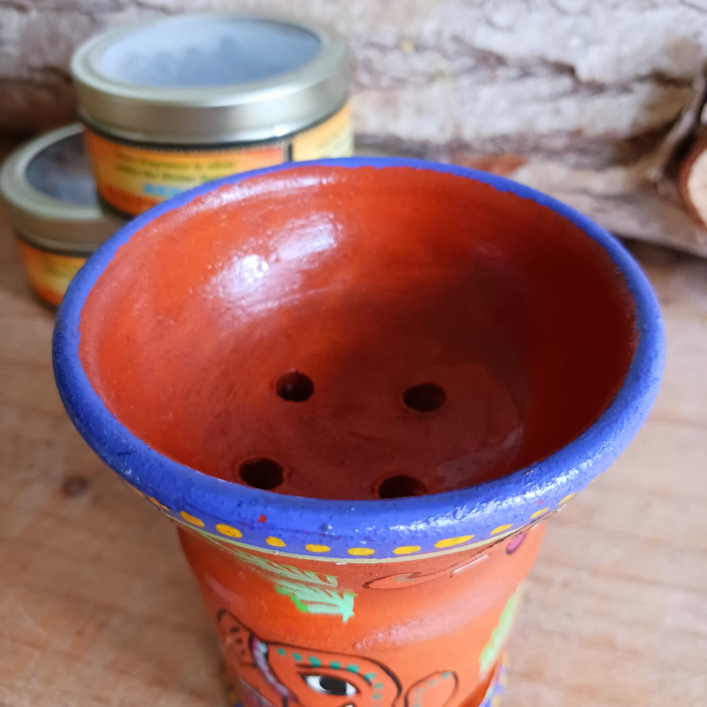 These attractive and unique little Mithila charcoal burners are hand painted in Madhyapur Thimi, just outside Kathmandu. Each piece is made in the traditional brightly coloured painting style from Mithila region. As they are hand painted each piece is unique and a variety of designs and colours are available. Perfect for burning resin incense, powders or dhoop cones.