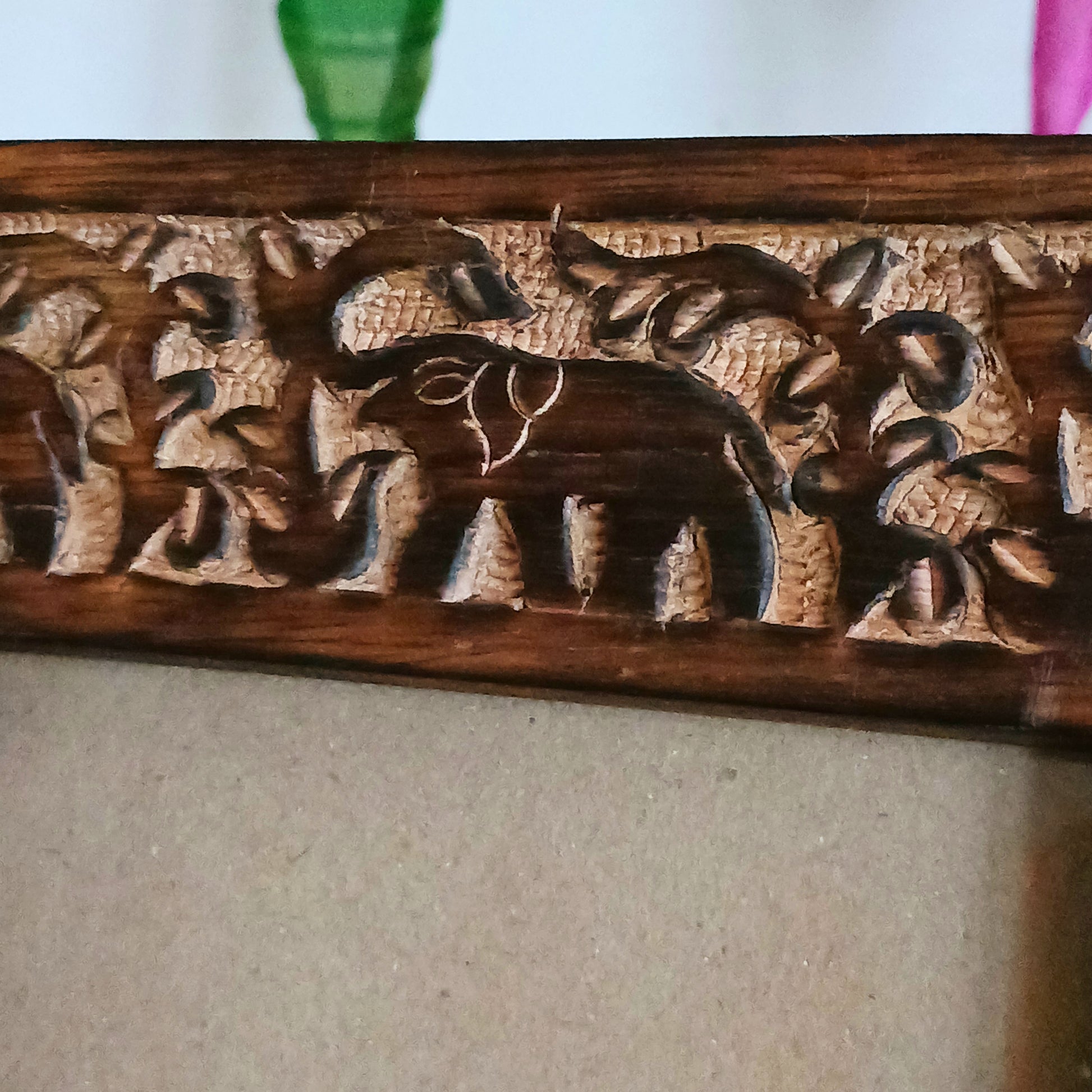 This free-standing mango wood photo frame has a wonderful carved elephant design along top and bottom. The frame will fit 4 x 6" photos (10 x 15cm). Ideal as an eco-friendly gift, or to frame your own happy memories.