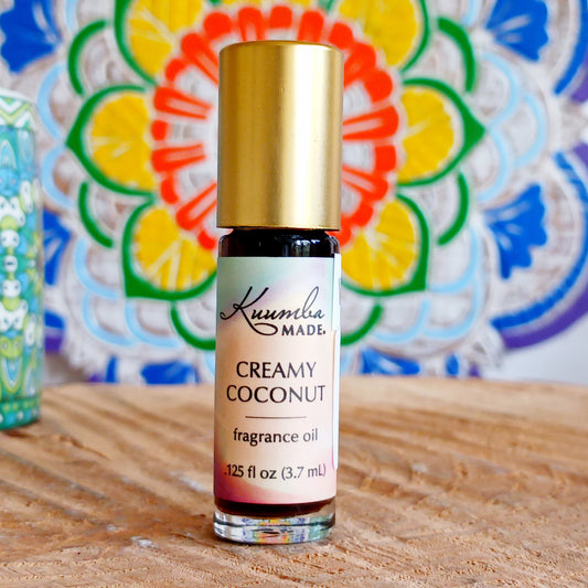 Tropical and inviting with hints of vanilla and raw sugar, this Coconut Cream Kuumba Made fragrance oil will remind you of a summer dance on the beach with flowers adorning your hair.