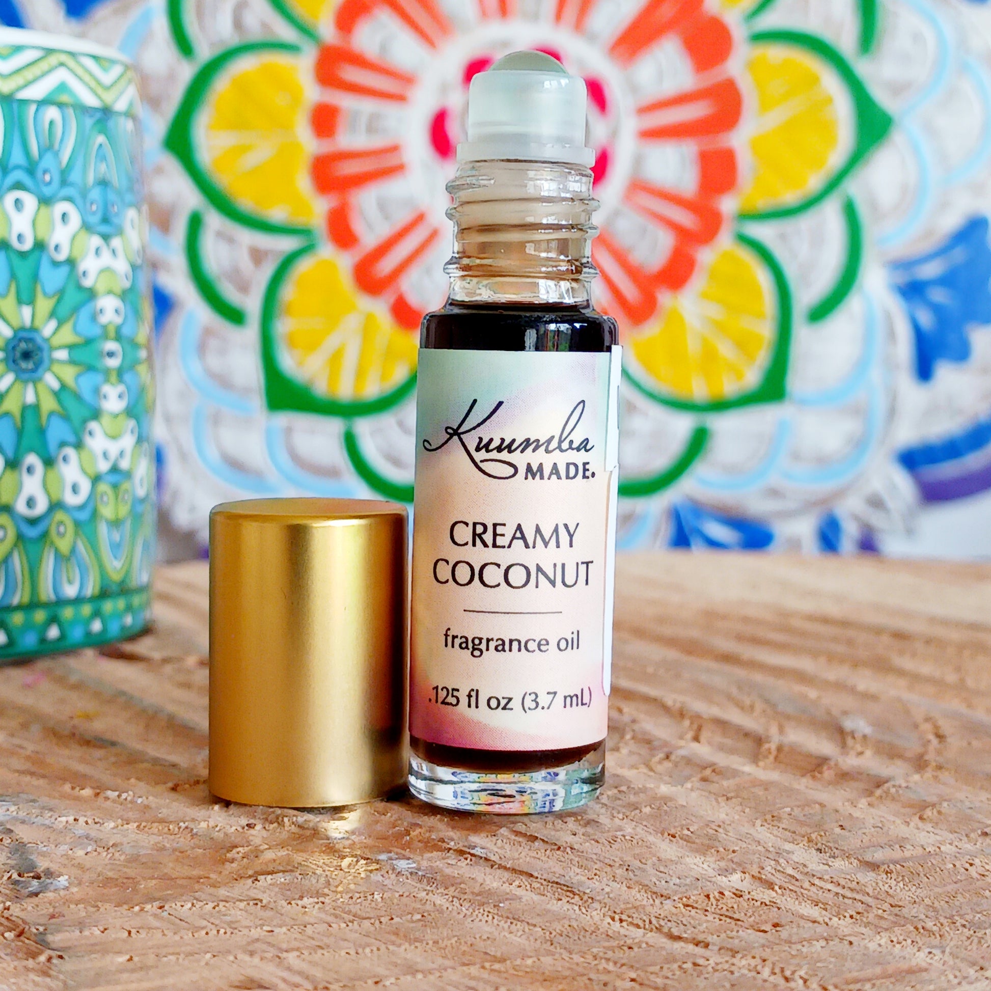 Tropical and inviting with hints of vanilla and raw sugar, this Coconut Cream Kuumba Made fragrance oil will remind you of a summer dance on the beach with flowers adorning your hair.