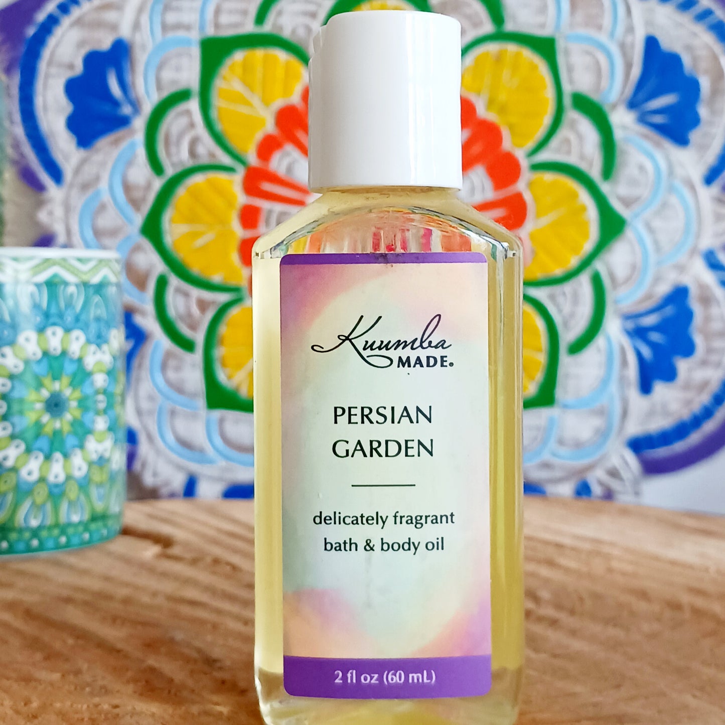 Grounded, smooth, very light and clean with a hint of mystery. A garden of earthly delights, this fast absorbing Persian Garden versatile Bath and Body Oil is packed with moisturizing agents that leave skin and hair radiant, healthy and softly aromatic. Use for daily moisturizing, a lavish massage, a nourishing bath, and as a deep conditioning hair treatment. Made with organic ingredients.