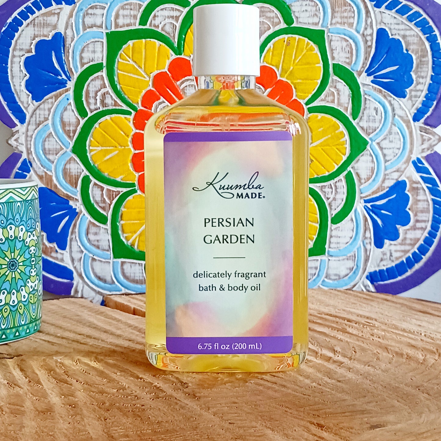 Grounded, smooth, very light and clean with a hint of mystery. A garden of earthly delights, this fast absorbing Persian Garden versatile Bath and Body Oil is packed with moisturizing agents that leave skin and hair radiant, healthy and softly aromatic. Use for daily moisturizing, a lavish massage, a nourishing bath, and as a deep conditioning hair treatment. Made with organic ingredients.