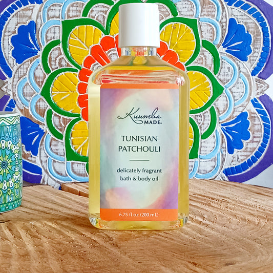 A unique, rich, slightly sweet and well balanced patchouli. Warms the heart, grounds the senses, this fast absorbing Tunisian Patchouli versatile Bath and Body Oil is packed with moisturizing agents that leave skin and hair radiant, healthy and softly aromatic. Use for daily moisturizing, a lavish massage, a nourishing bath, and as a deep conditioning hair treatment. Made with organic ingredients.