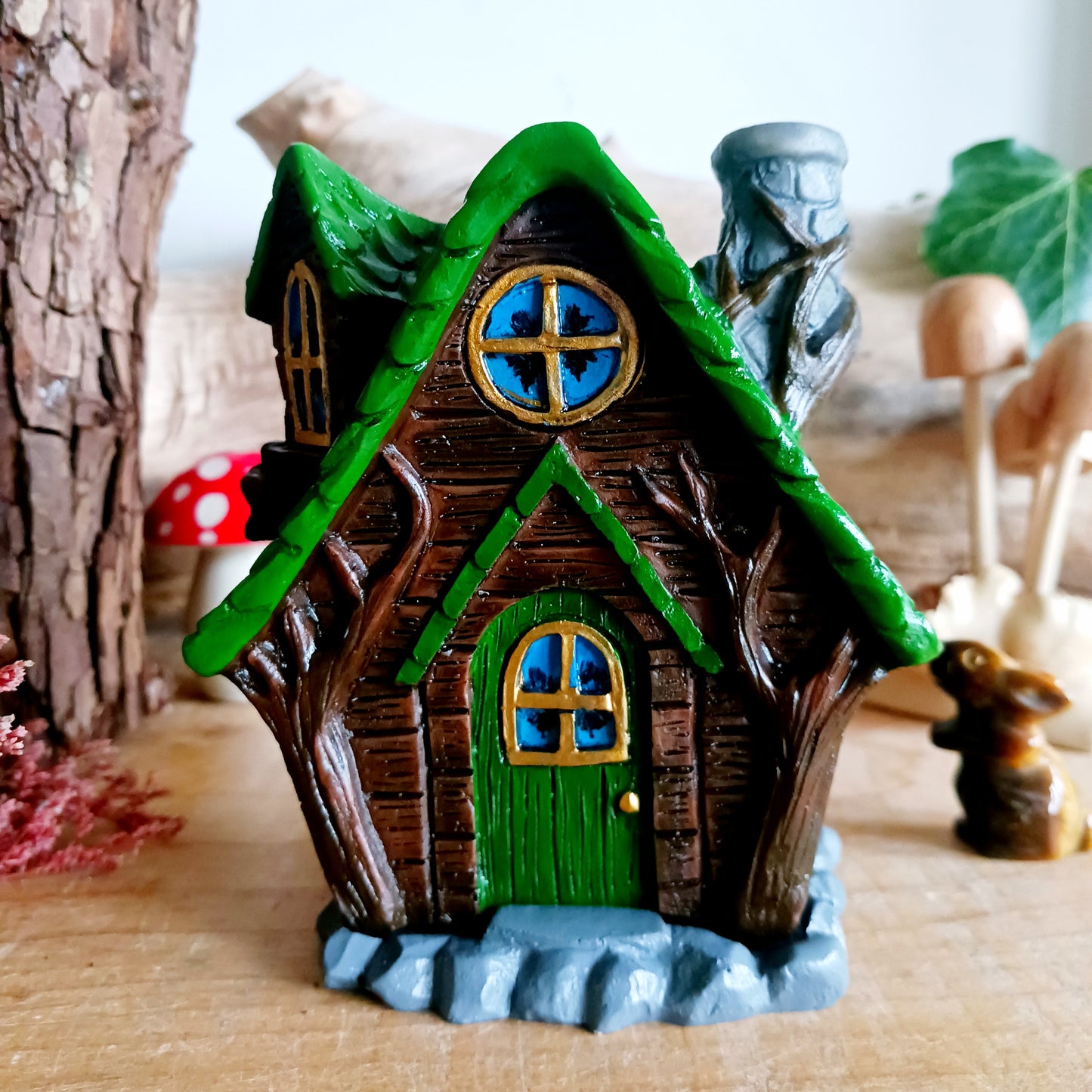 This adorable and detailed incense cone burner is shaped like a little fairy house called Woody Lodge. Designed by Lisa Parker, you place an incense cone inside the Woody Lodge and watch as smoke rises from the chimney. The house comes in a little gift box making it the perfect gift for fairy and incense lovers!