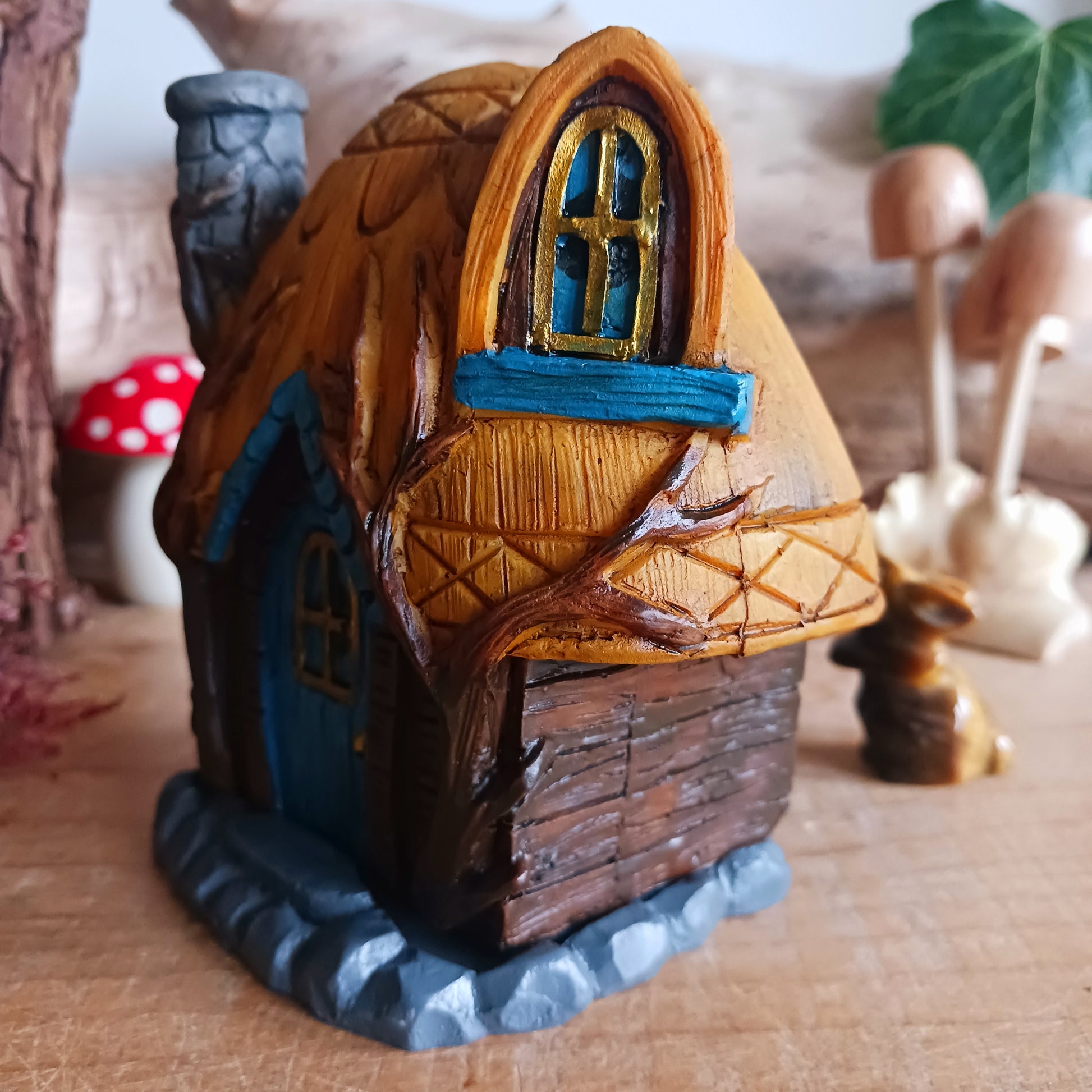 This adorable and detailed incense cone burner is shaped like a little fairy house called Buttercup Cottage. 
 Designed by Lisa Parker, you place an incense cone inside the cottage and watch as smoke rises from the chimney. The house comes in a little gift box making it the perfect gift for fairy and incense lovers!