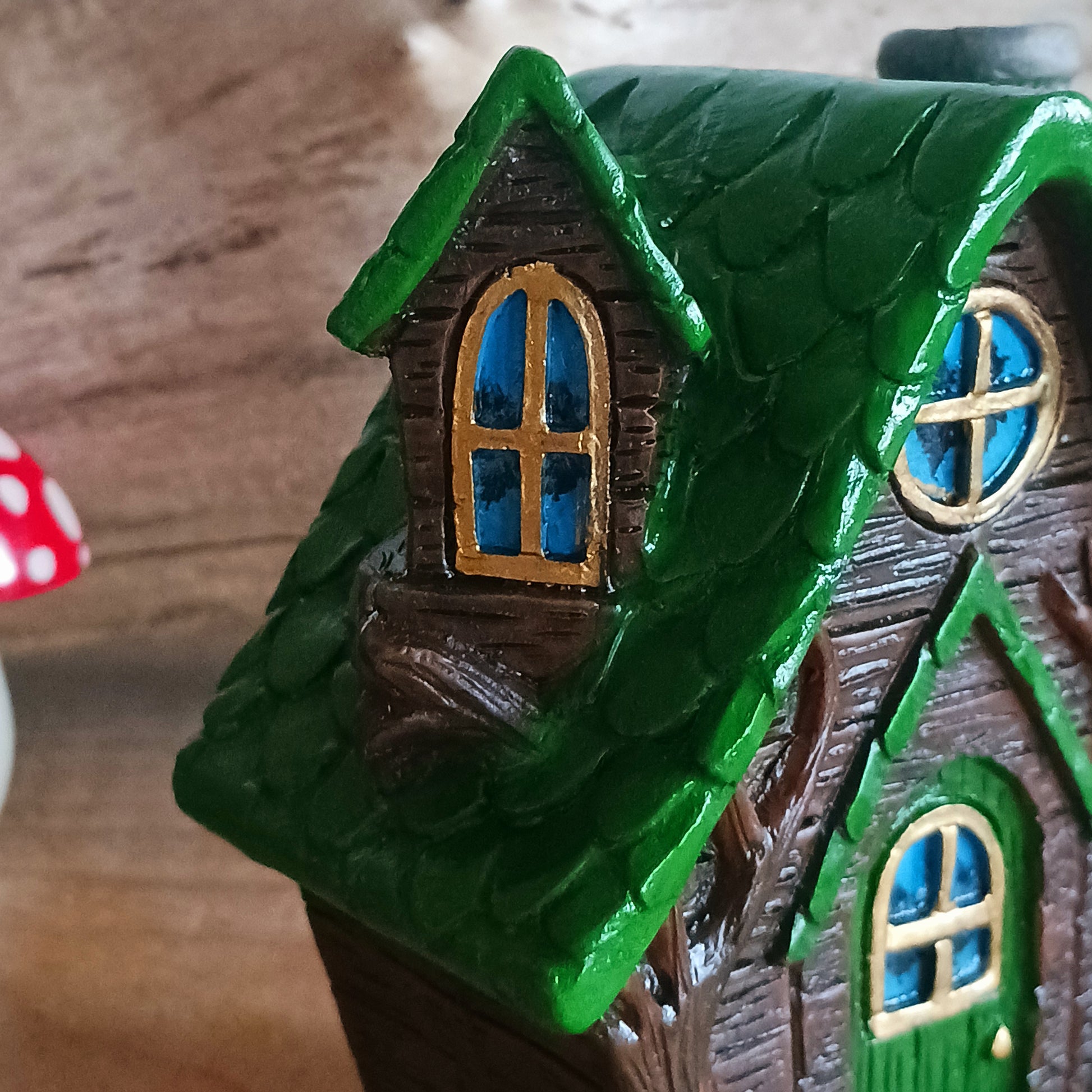 This adorable and detailed incense cone burner is shaped like a little fairy house called Woody Lodge. Designed by Lisa Parker, you place an incense cone inside the Woody Lodge and watch as smoke rises from the chimney. The house comes in a little gift box making it the perfect gift for fairy and incense lovers!