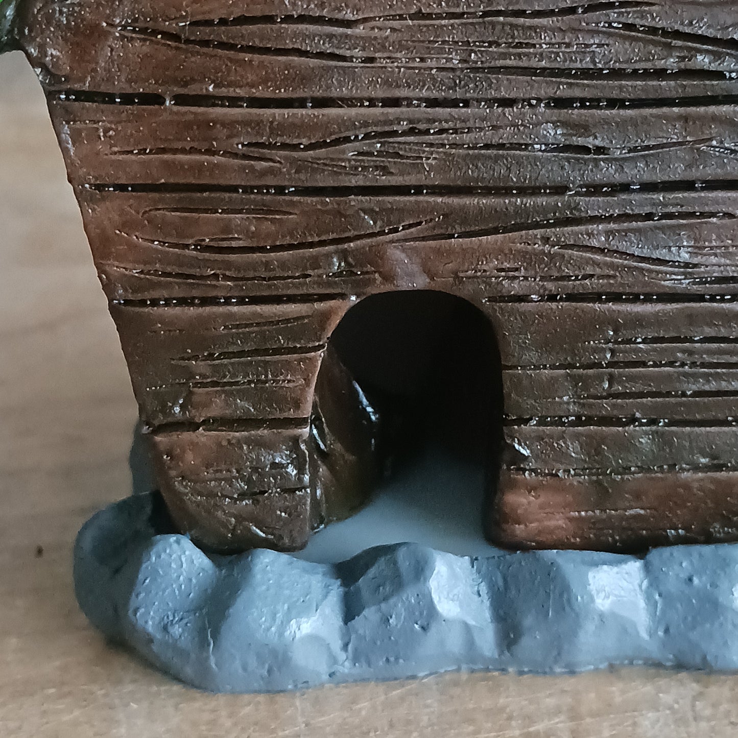 This adorable and detailed incense cone burner is shaped like a little fairy house called Woody Lodge. Designed by Lisa Parker, you place an incense cone inside the Woody Lodge and watch as smoke rises from the chimney. The house comes in a little gift box making it the perfect gift for fairy and incense lovers!