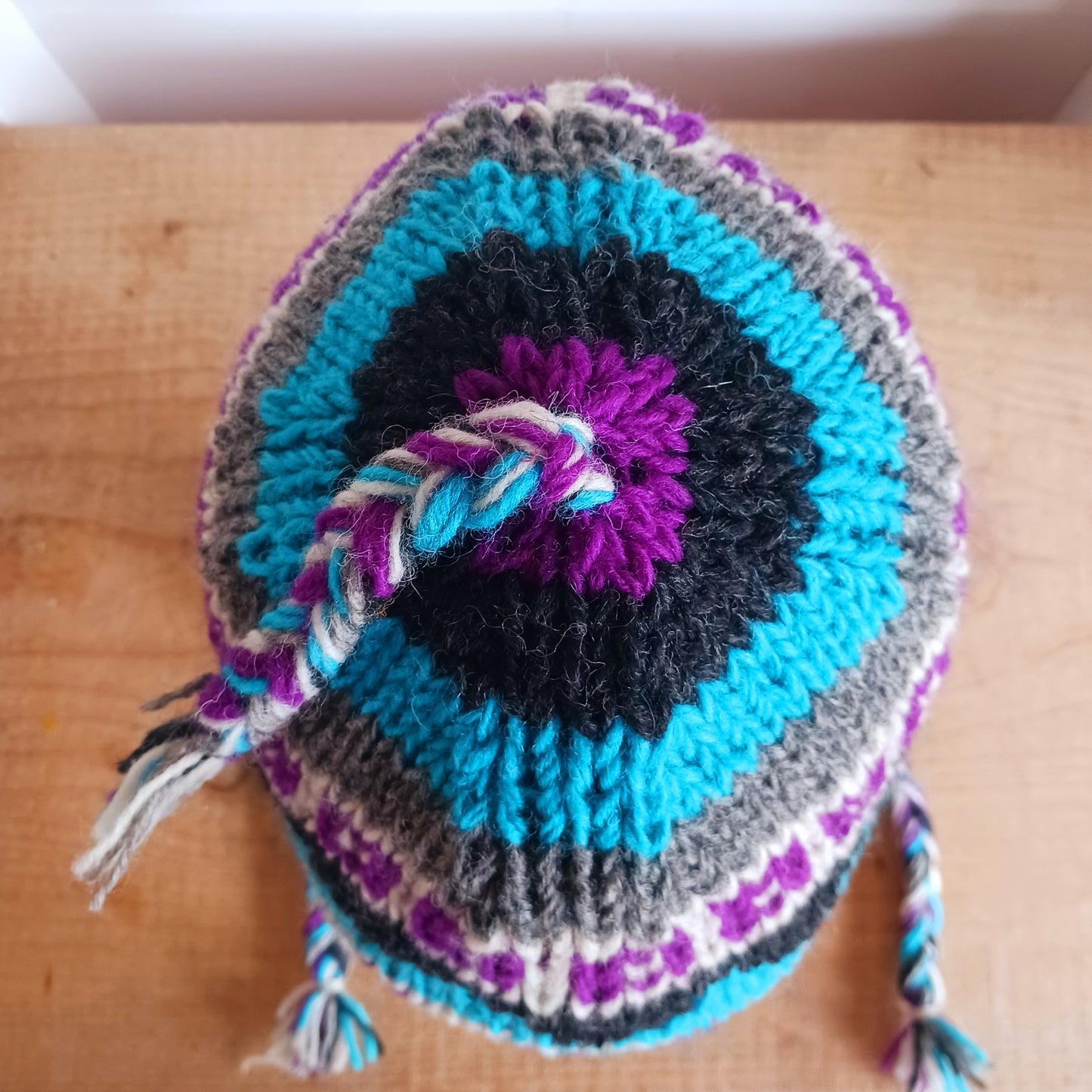 Chunky wool earflap hats hand made in Nepal with fleece lining for extra warmth and comfort, this handmade hat is awesomely warm.