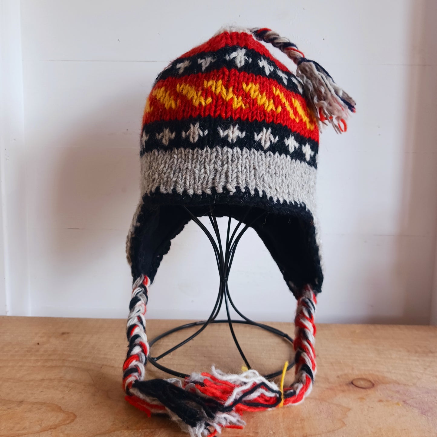 Chunky wool earflap hats hand made in Nepal with fleece lining for extra warmth and comfort, this handmade hat is awesomely warm.