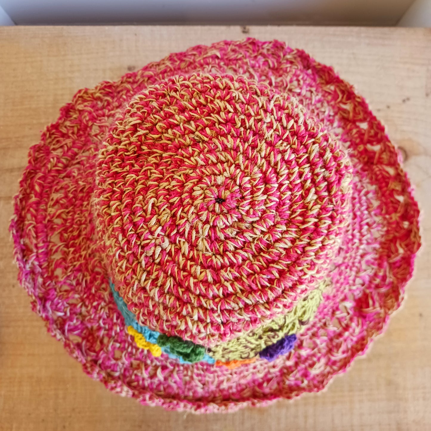 Handmade hemp & cotton boho festival hat with crochet flowers. A unique accessory that beautifully embodies the free-spirited essence of Bohemian style. Handcrafted with care and creativity, each of these hats is a harmonious blend of hemp and cotton, resulting in a distinctive piece that exudes both fashion and sustainability. They're ideal for music festivals, beach outings, or simply just to brighten up any outfit.