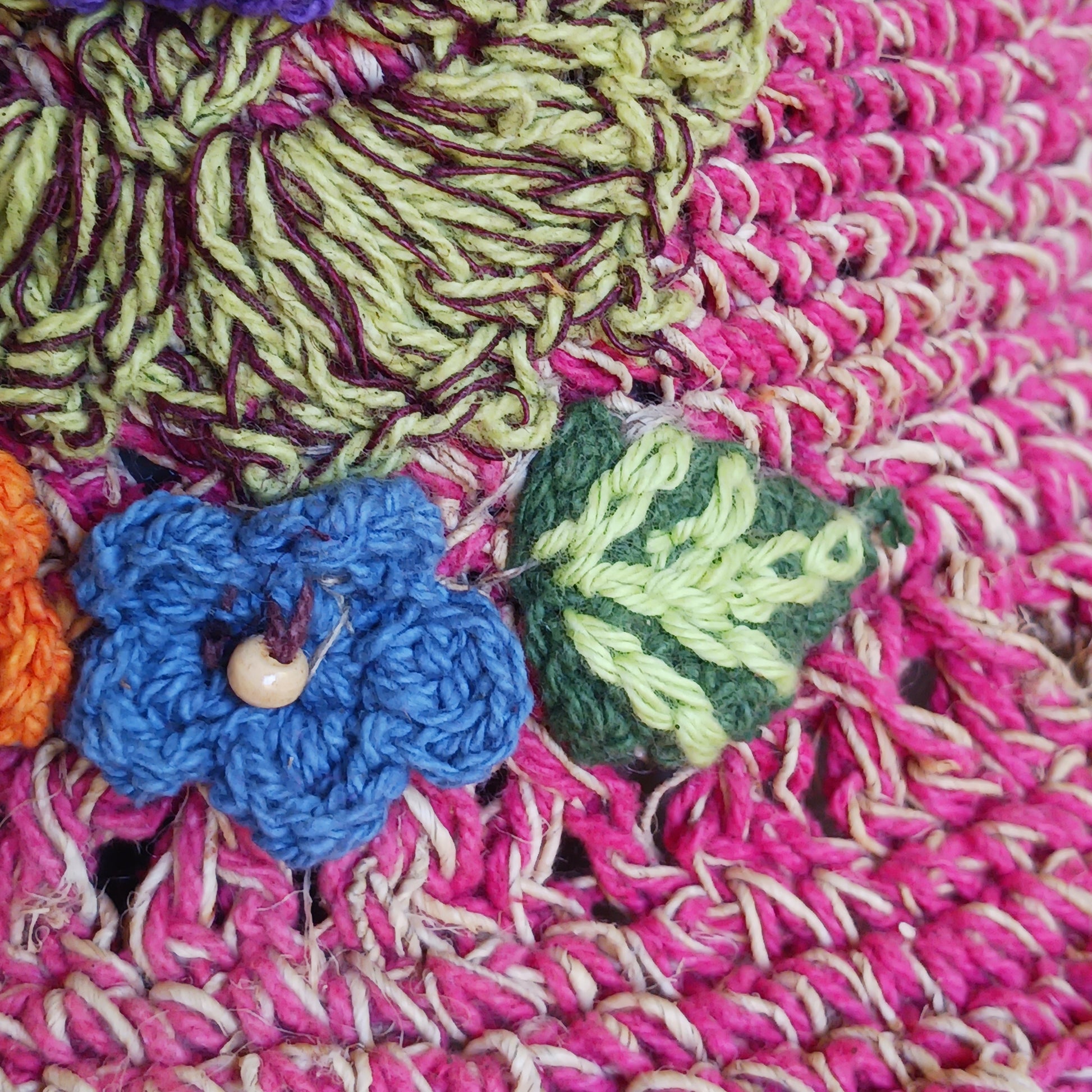 Handmade hemp & cotton boho festival hat with crochet flowers. A unique accessory that beautifully embodies the free-spirited essence of Bohemian style. Handcrafted with care and creativity, each of these hats is a harmonious blend of hemp and cotton, resulting in a distinctive piece that exudes both fashion and sustainability. They're ideal for music festivals, beach outings, or simply just to brighten up any outfit.