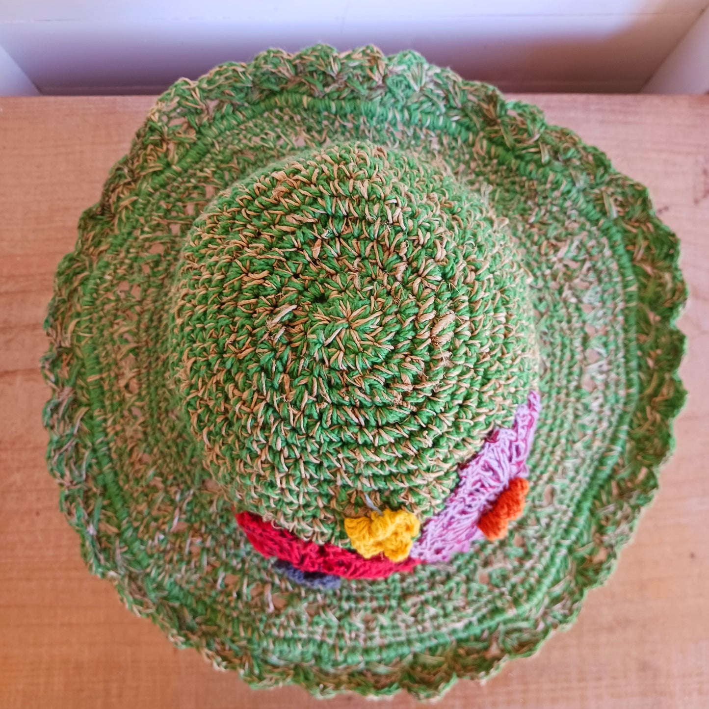 Hand-knitted Hemp & Cotton Boho Festival Hat with Rainbow band. A unique accessory that beautifully embodies the free-spirited essence of Bohemian style. Handcrafted with care, each of these hats is a harmonious blend of hemp and cotton, resulting in a distinctive piece that exudes both fashion and sustainability. They're ideal for music festivals, beach outings, or simply just to brighten up any outfit.