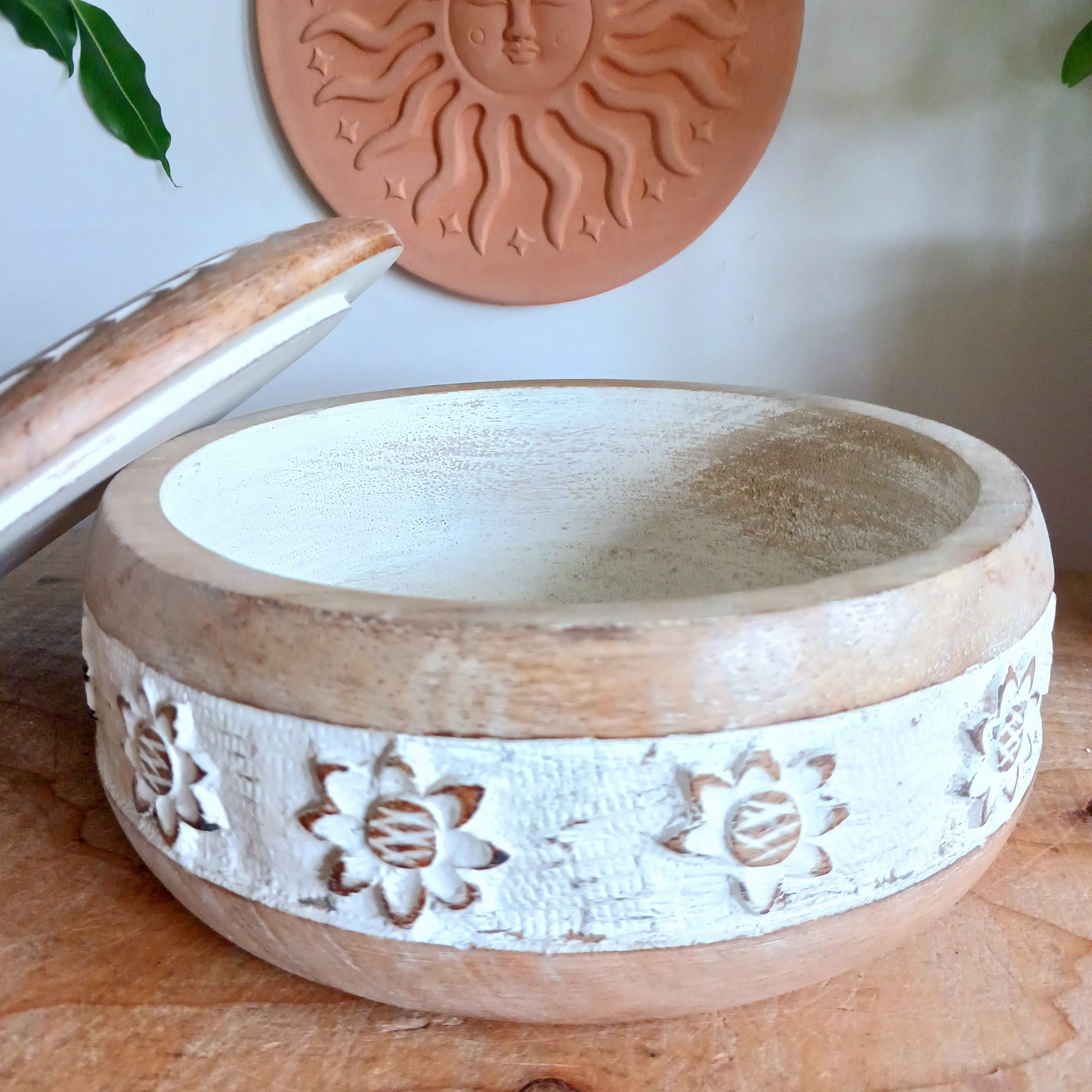 Elevate your home décor with this beautifully handcrafted Mango Wood Decorative Storage Pot featuring intricate whitewash patterns and a secure fitted lid. Designed to blend rustic charm with modern elegance, this eco-friendly storage container adds warmth and sophistication to any space.