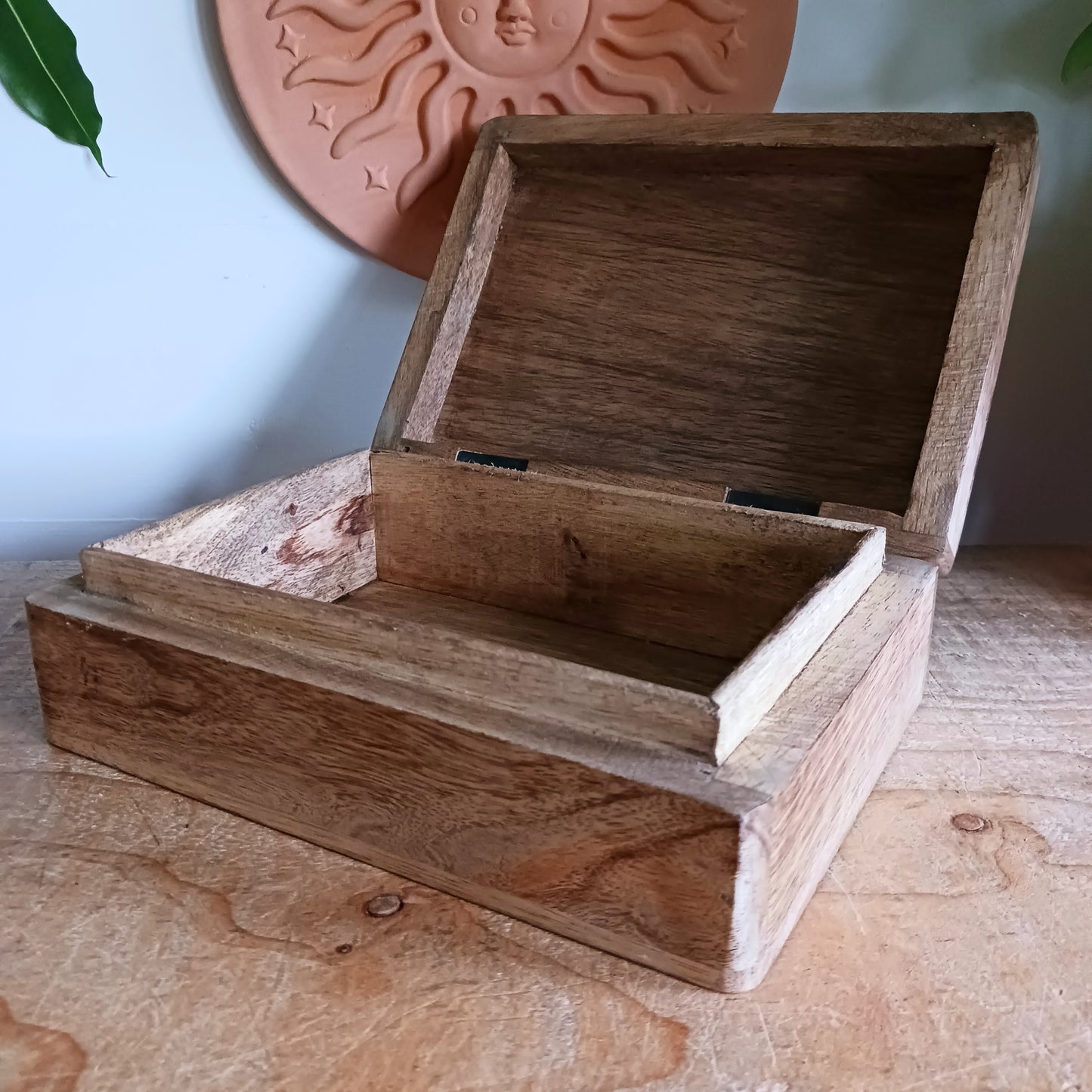 Add timeless craftsmanship to your home with this beautifully hand carved mango wood keepsake box, featuring an intricate Celtic cross design engraved on the lid. Expertly crafted from durable, sustainable mango wood, this decorative wooden box blends traditional Celtic artistry with practical storage.
