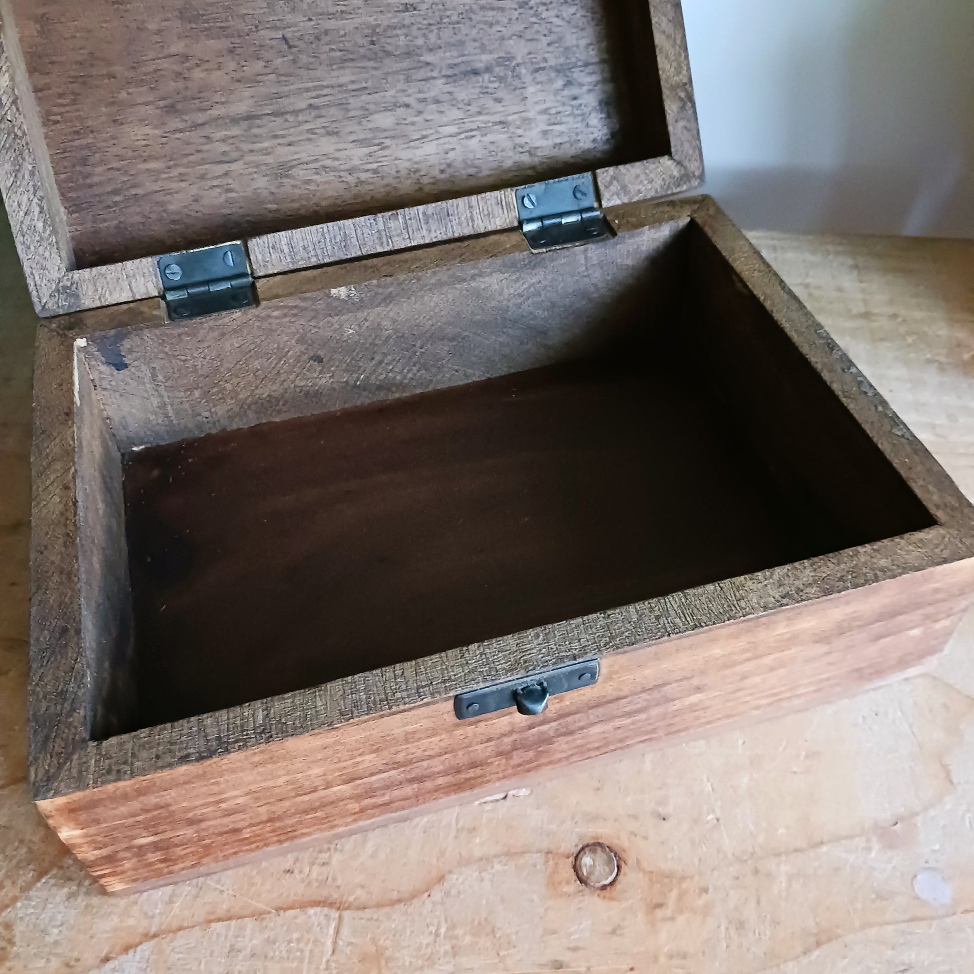 Add a touch of cultural elegance to your home with this Ceramic Glazed Wood Box. Expertly crafted, it combines the durability of solid wood with the glossy sophistication of glazed ceramic, making it both functional and decorative.