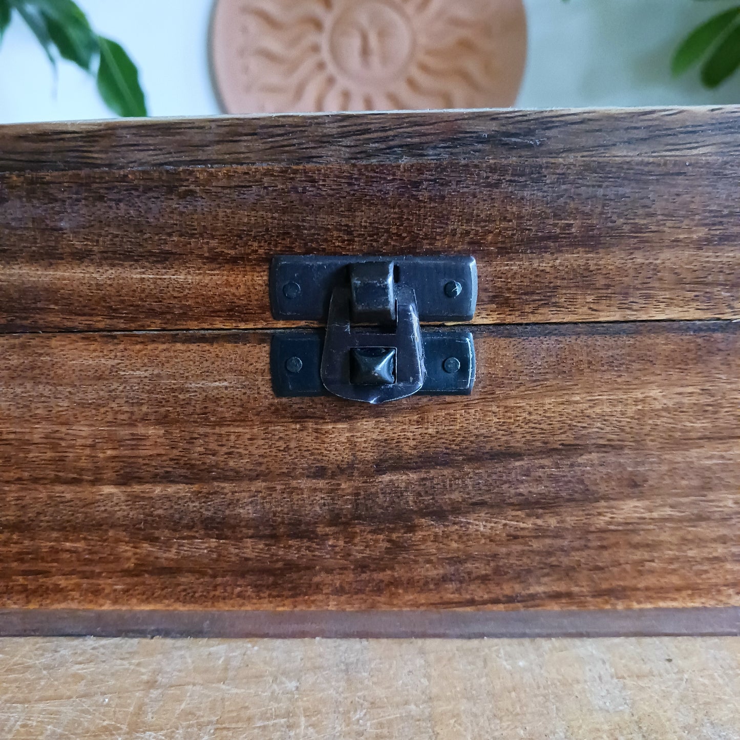 Add a touch of cultural elegance to your home with this Ceramic Glazed Wood Box. Expertly crafted, it combines the durability of solid wood with the glossy sophistication of glazed ceramic, making it both functional and decorative.