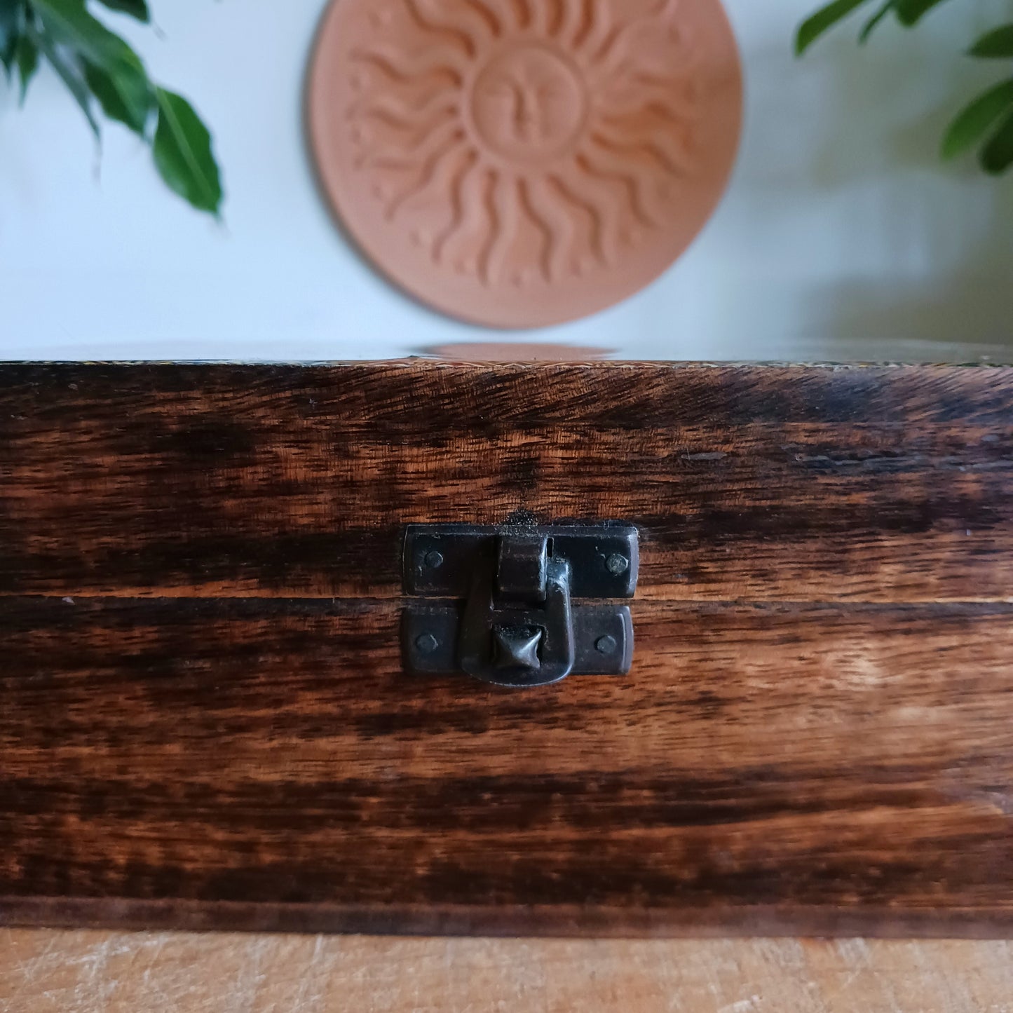 Add a touch of cultural elegance to your home with this Ceramic Glazed Wood Box. Expertly crafted, it combines the durability of solid wood with the glossy sophistication of glazed ceramic, making it both functional and decorative.