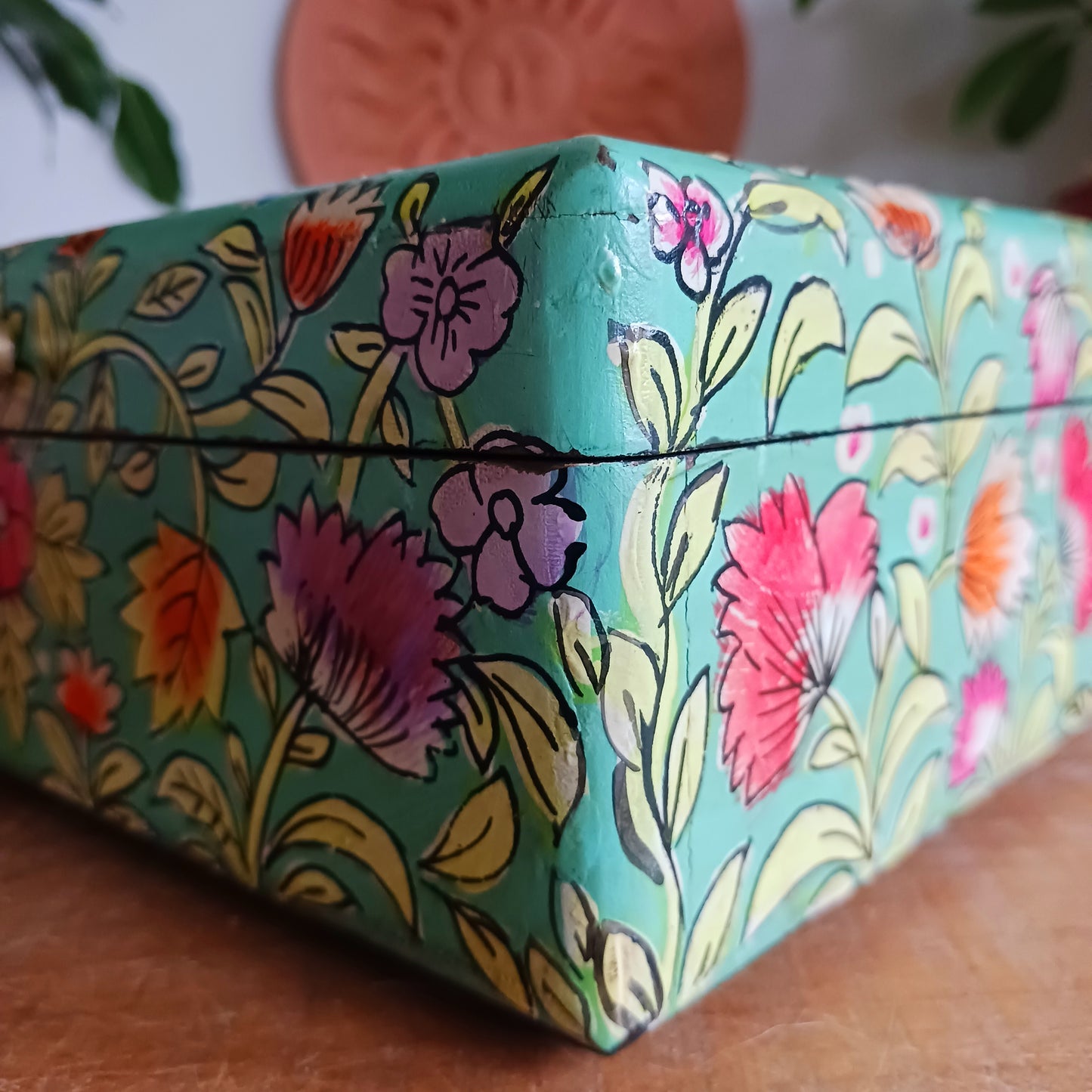 The Saanvi Handcrafted Small Wooden Box is a sustainable gift of beauty, designed to bring charm and practicality to any space.