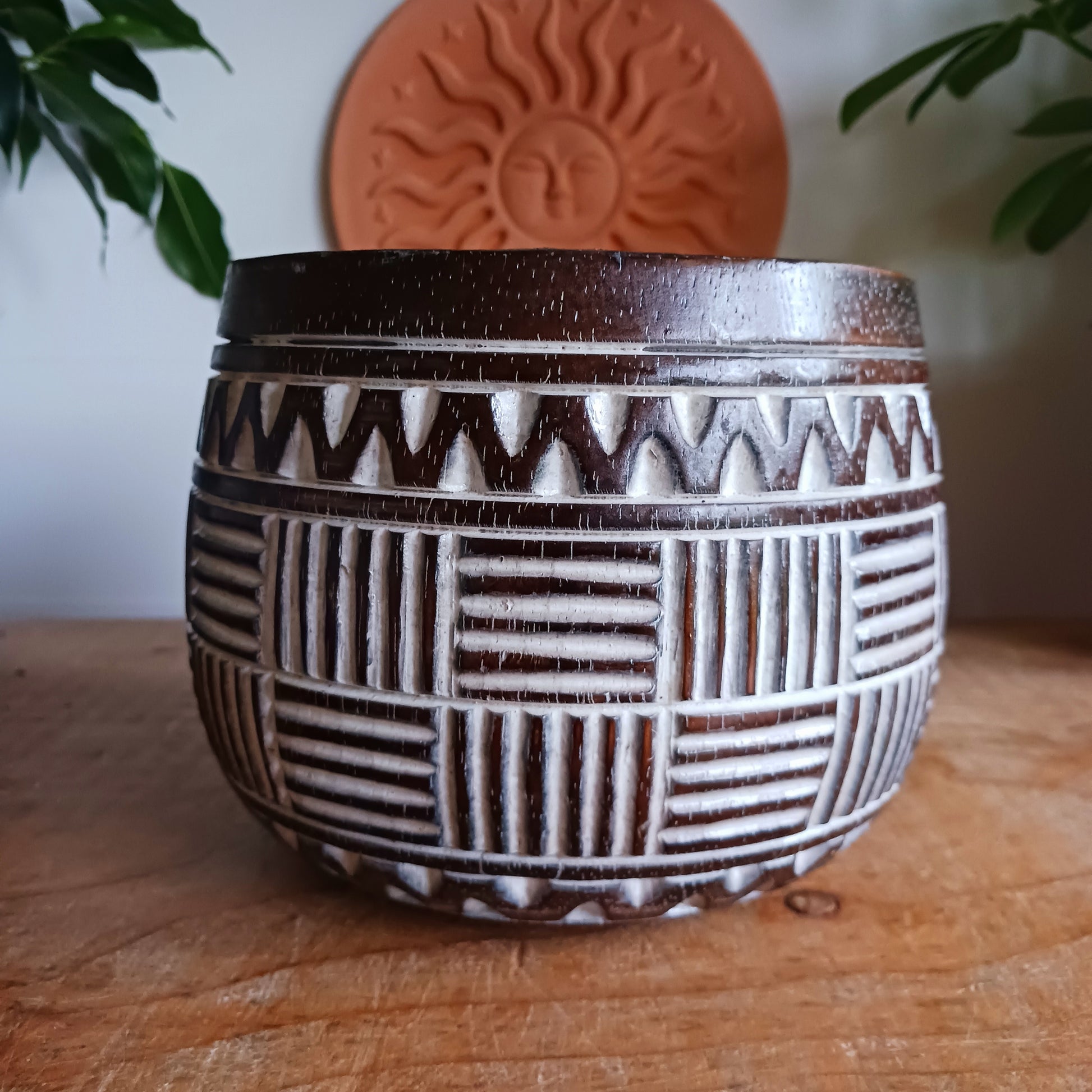 Bring authentic Balinese craftsmanship into your home with this hand-carved tribal wooden pot. Perfect for storing trinkets, small treasures, or displaying your favourite plants, this versatile pot adds a touch of boho charm to any space.