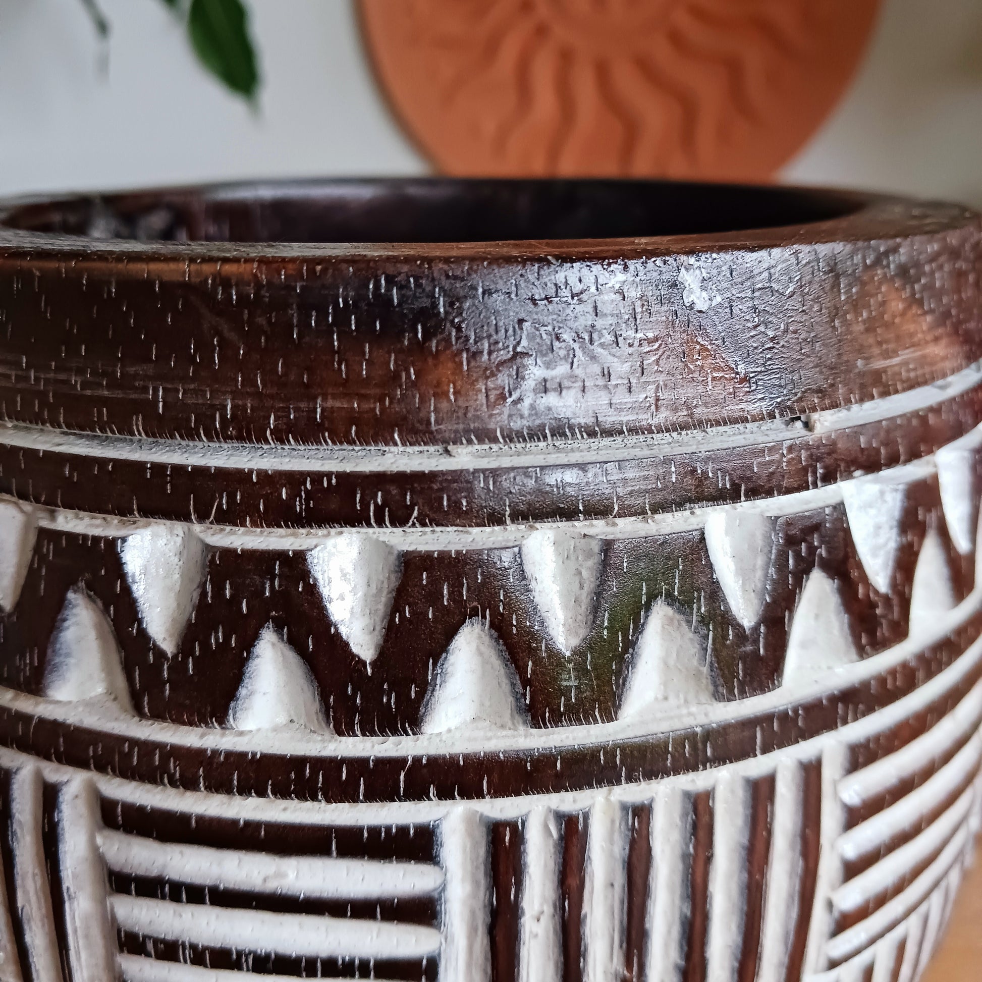 Bring authentic Balinese craftsmanship into your home with this hand-carved tribal wooden pot. Perfect for storing trinkets, small treasures, or displaying your favourite plants, this versatile pot adds a touch of boho charm to any space.