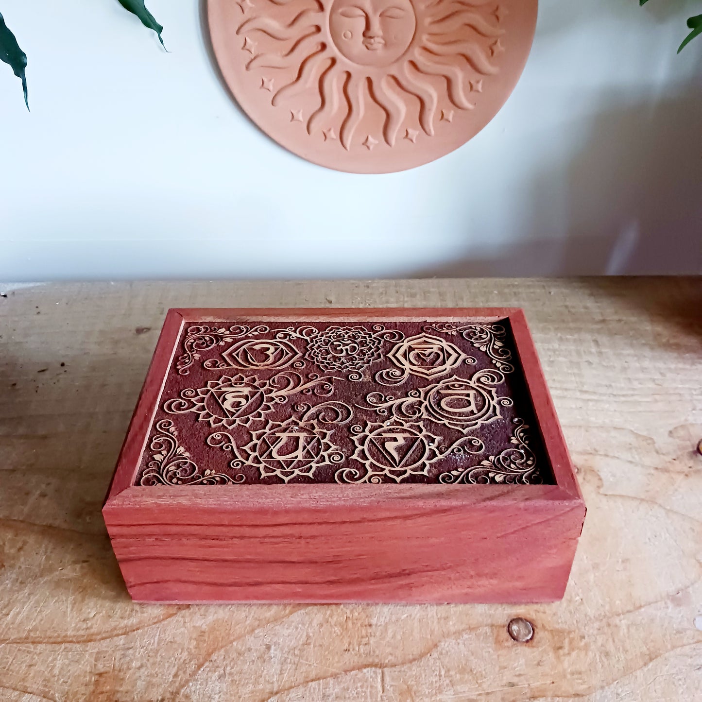 Celebrate the elegance of hand-carved craftsmanship with this Wooden Keepsake Box Om, made from sustainably sourced mango wood in India.