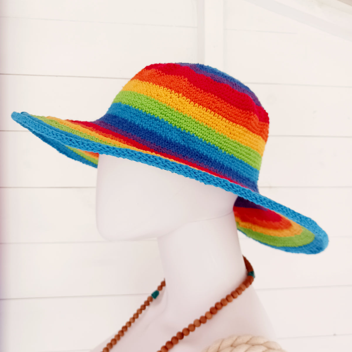 Add a splash of colour to your summer wardrobe with this beautiful Handmade Rainbow Crochet Cotton Sun Hat. Carefully handcrafted, this vibrant hat is designed to keep you comfortable while making a bold statement wherever your adventures take you.