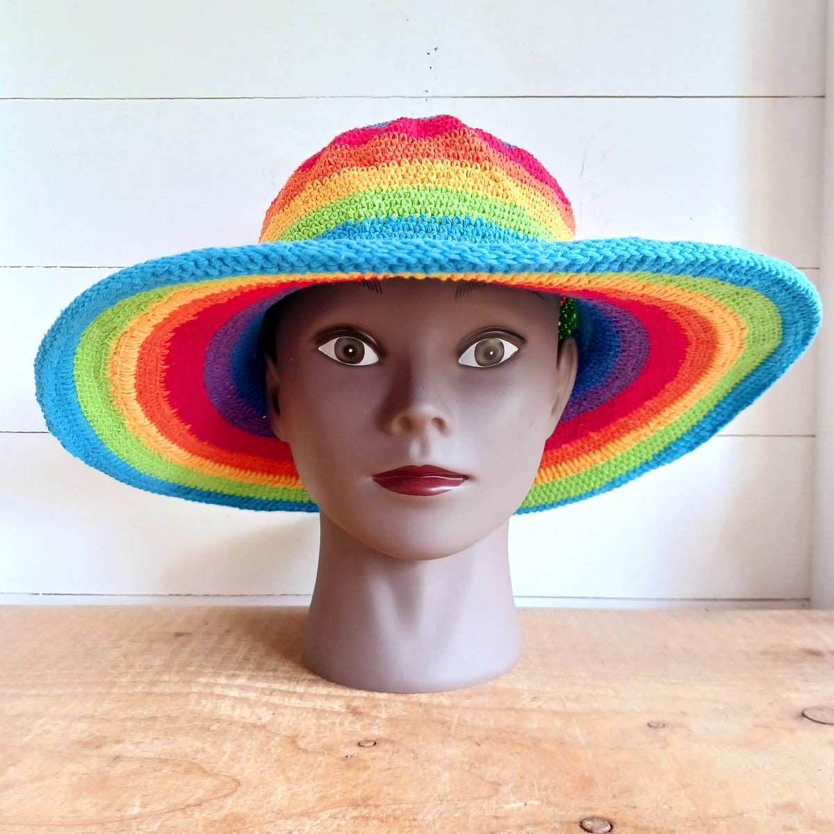 Add a splash of colour to your summer wardrobe with this beautiful Handmade Rainbow Crochet Cotton Sun Hat. Carefully handcrafted, this vibrant hat is designed to keep you comfortable while making a bold statement wherever your adventures take you.