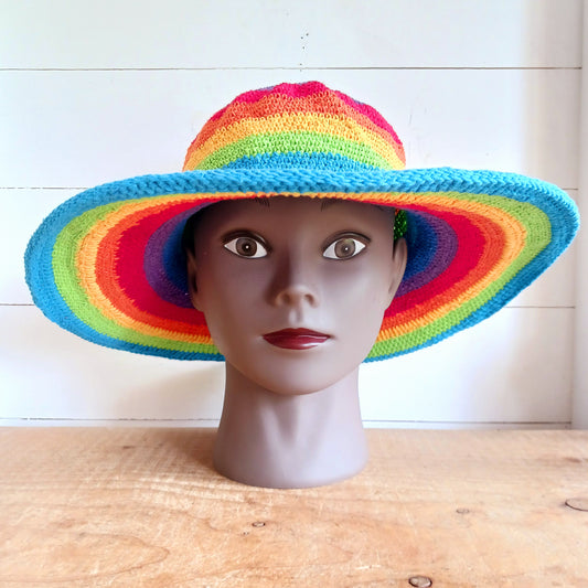Add a splash of colour to your summer wardrobe with this beautiful Handmade Rainbow Crochet Cotton Sun Hat. Carefully handcrafted, this vibrant hat is designed to keep you comfortable while making a bold statement wherever your adventures take you.