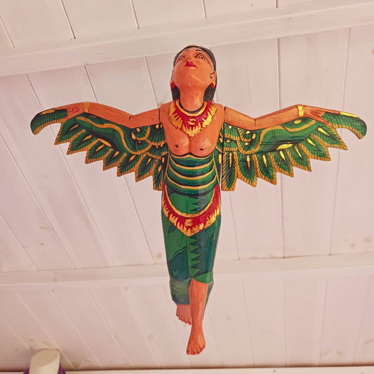 Bring a touch of the exotic to your home with this beautiful Flying Dewi Sri Lady Mobile. Hand-crafted in Bali, it features rich colours, gold detailing and a strong twine for easy hanging.