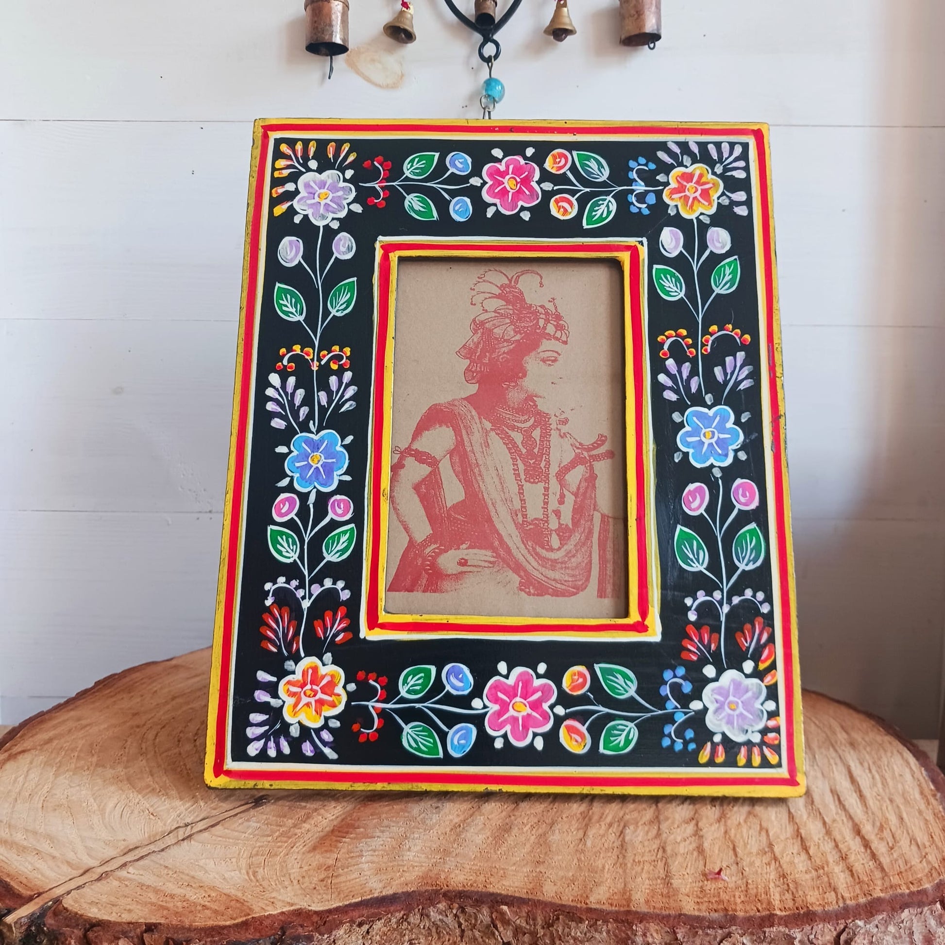 These lovely handmade wooden photo frames are made from sustainable mango wood and hand painted with floral designs. Each is decorated with vibrant flower designs in a beautiful tapestry of colour. This is impressive Indian artistry, ideal for displaying your favorite prints. Each is unique and perfect for gifting.