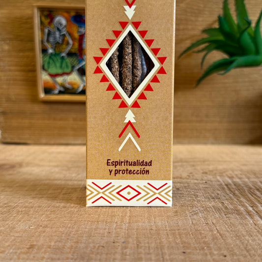 Step into the sacred fires of purification with Mystic Spirits Palo Santo and Copal Smudge Sticks. Hand-rolled in India from a sacred blend of fragrant gums, resins, wood powders, herbs, and spices, these incense sticks carry the wisdom of the ancients.

Palo Santo, the revered “holy wood,” offers a gentle fragrance that is woody, subtly sweet, with whispers of citrus and mint. It is known among shamans for clearing negative energies, uplifting the spirit, and creating sacred space.