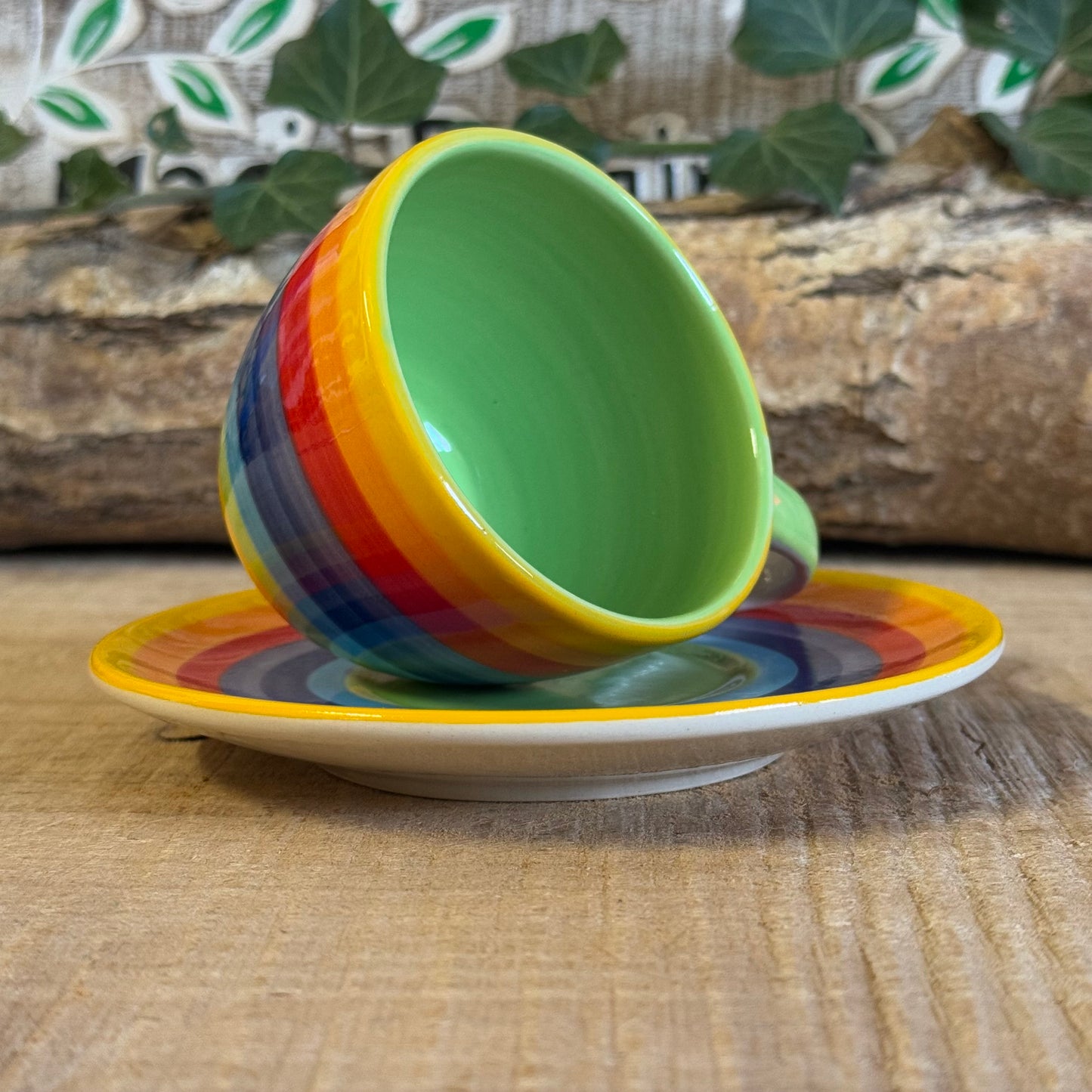 Enjoy your coffee in style with our handmade rainbow stripe ceramic cup & saucer. Fair-trade from Thailand, this vibrant, hand-painted set is dishwasher and microwave safe—perfect for brightening up any home.