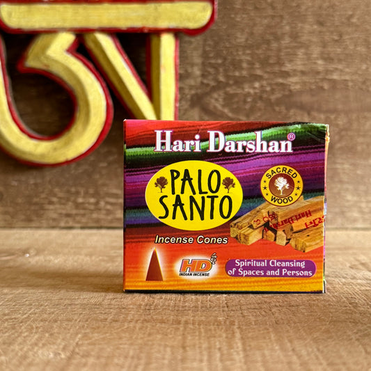 Cleanse your space and elevate your spirit with Hari Darshan Palo Santo Incense Cones, handcrafted in Bangalore, India, by expert incense makers known for their devotion to purity and tradition. Infused with the mystical essence of Palo Santo, or Holy Wood, these cones emit a woody, citrus-sweet fragrance that purifies energy and restores balance.

For centuries, Palo Santo has been used in spiritual rituals, meditation, and healing ceremonies to clear negativity and invite peace. As each cone burns, it rel
