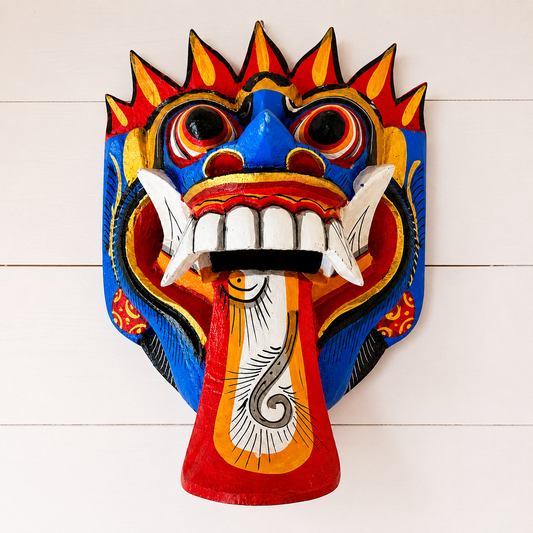 Hand carved Balinese Rangda Mask wall hanging featuring vibrant blue, red and gold colours, traditional tribal design and authentic Indonesian craftsmanship.