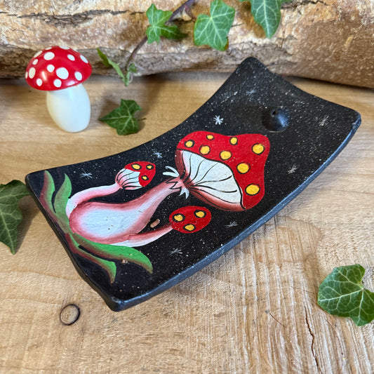 Invite the calm of the forest into your home with this Terracotta Mushroom Incense Holder, lovingly handcrafted in Bali. Each piece is formed from natural terracotta and hand painted with earthy tones and fine detailing, echoing the peaceful spirit of nature.