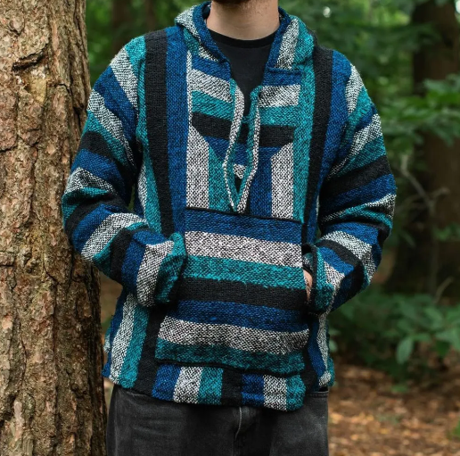 Mexican Jergas or Baja tops are very practical hooded outwear made from a cotton acrylic blend which gives them a durable rustic exterior with a soft, cosy brush interior.

The weave of the fabric makes the Baja both breathable and warm and therefore a firm favourite for festivalgoers and people involved in outdoor sporting activities. The tops are great for cool summer evenings and are available in sizes generous enough to wear with multiple layers underneath.