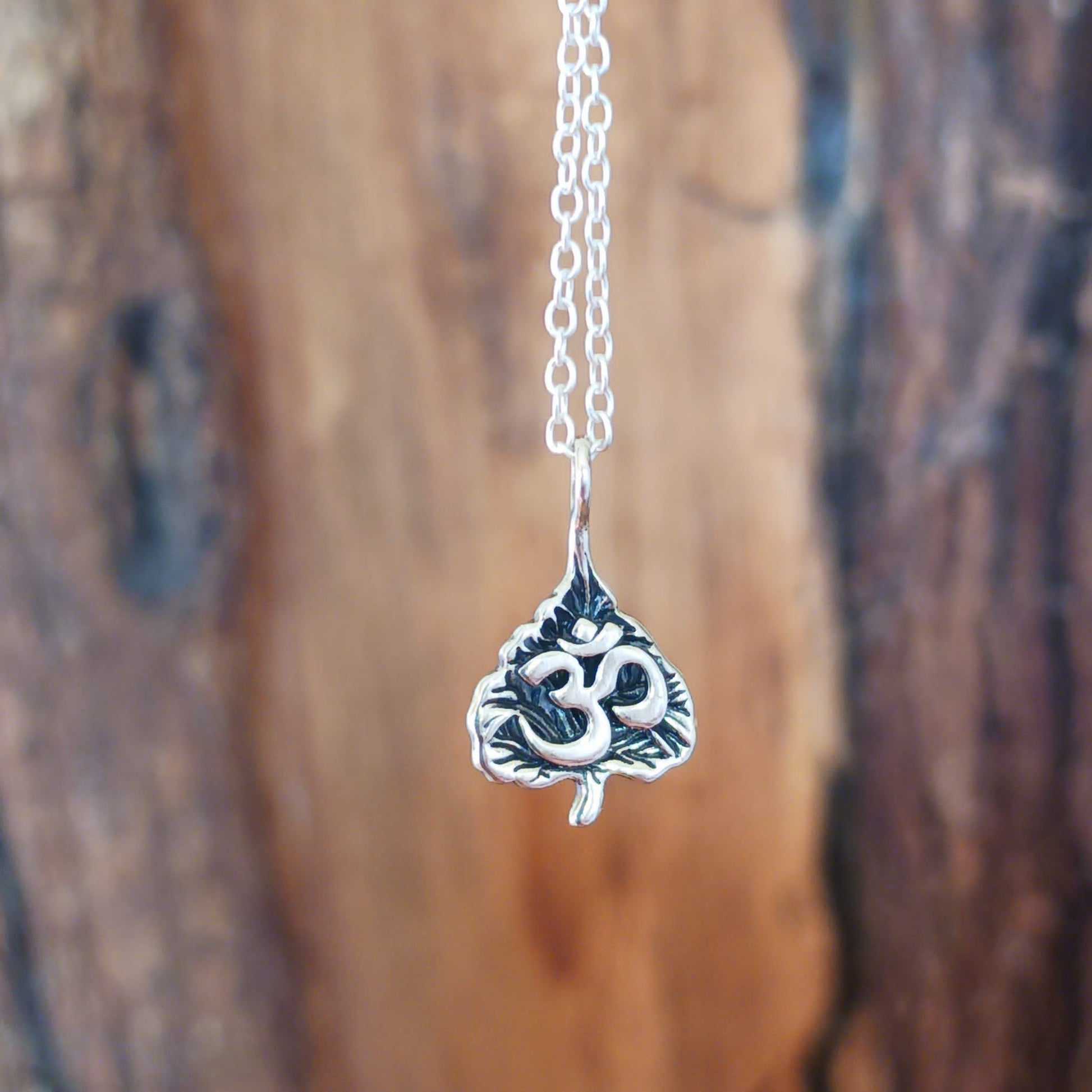 Om Symbol in Leaf Pendant Necklace