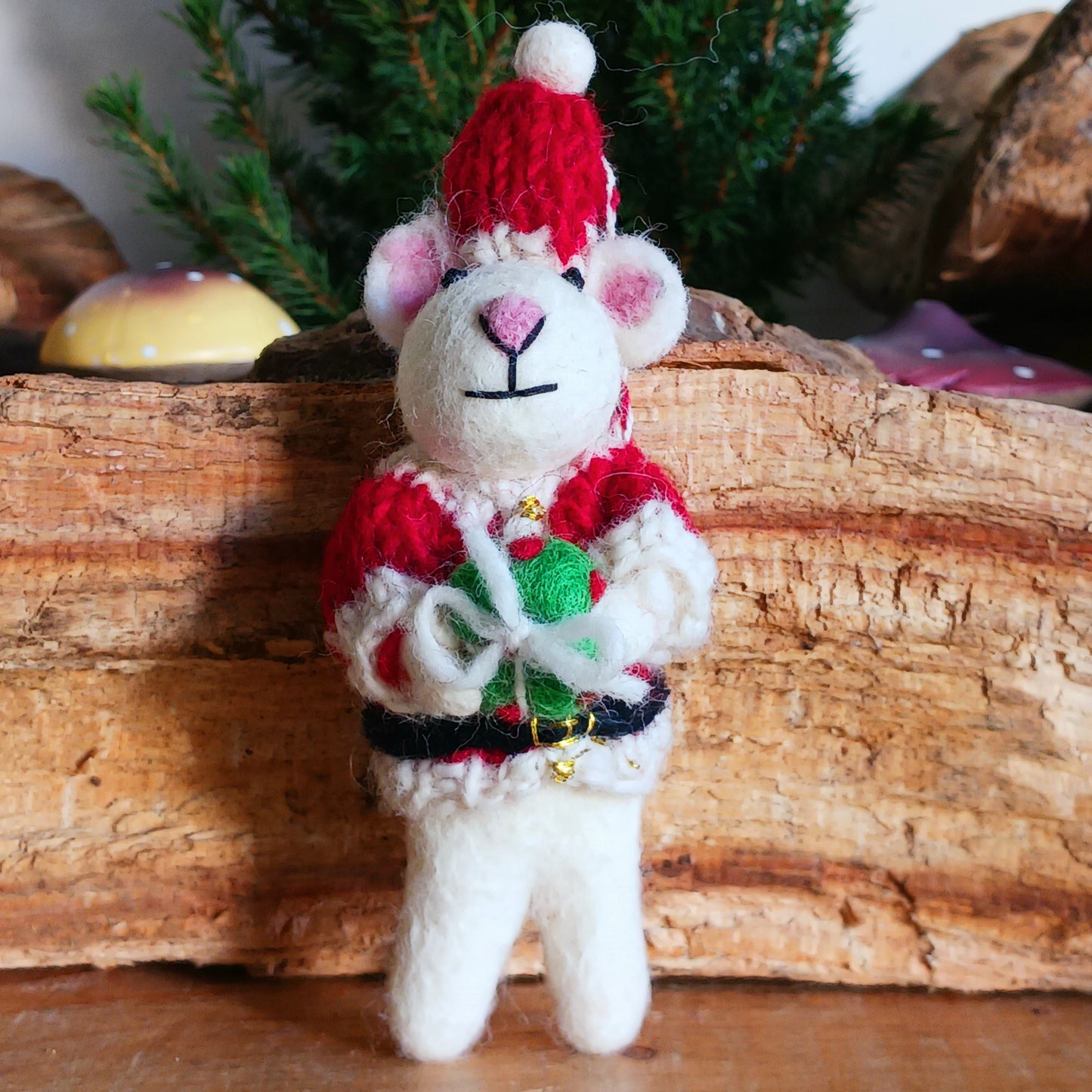 Meet our endearing little Christmas mice, dressed in vibrant Santa knitwear, donning a classic Santa outfit ready to spread festive cheer. Each ornament is lovingly handcrafted, capturing the magic and childlike wonder of the holiday season.