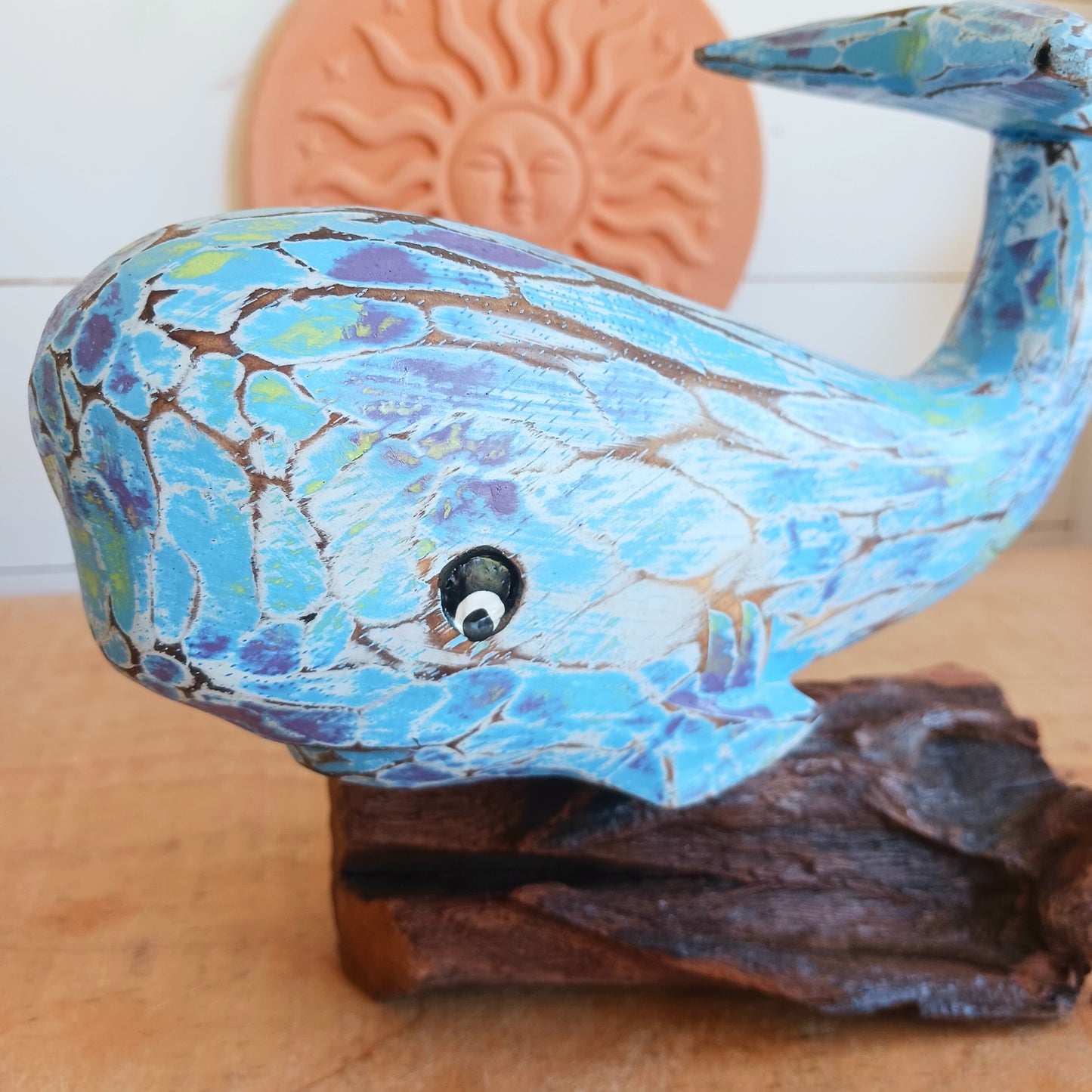Bring the beauty of the coast into your home with this charming Colourful Wooden Whale. Handcrafted with a rustic finish and vibrant colours, this decorative wooden whale captures the relaxed spirit of seaside living. Whether displayed in a living room, bathroom, hallway, beach house, or coastal-themed space, it adds warmth, character, and nautical charm to your décor.