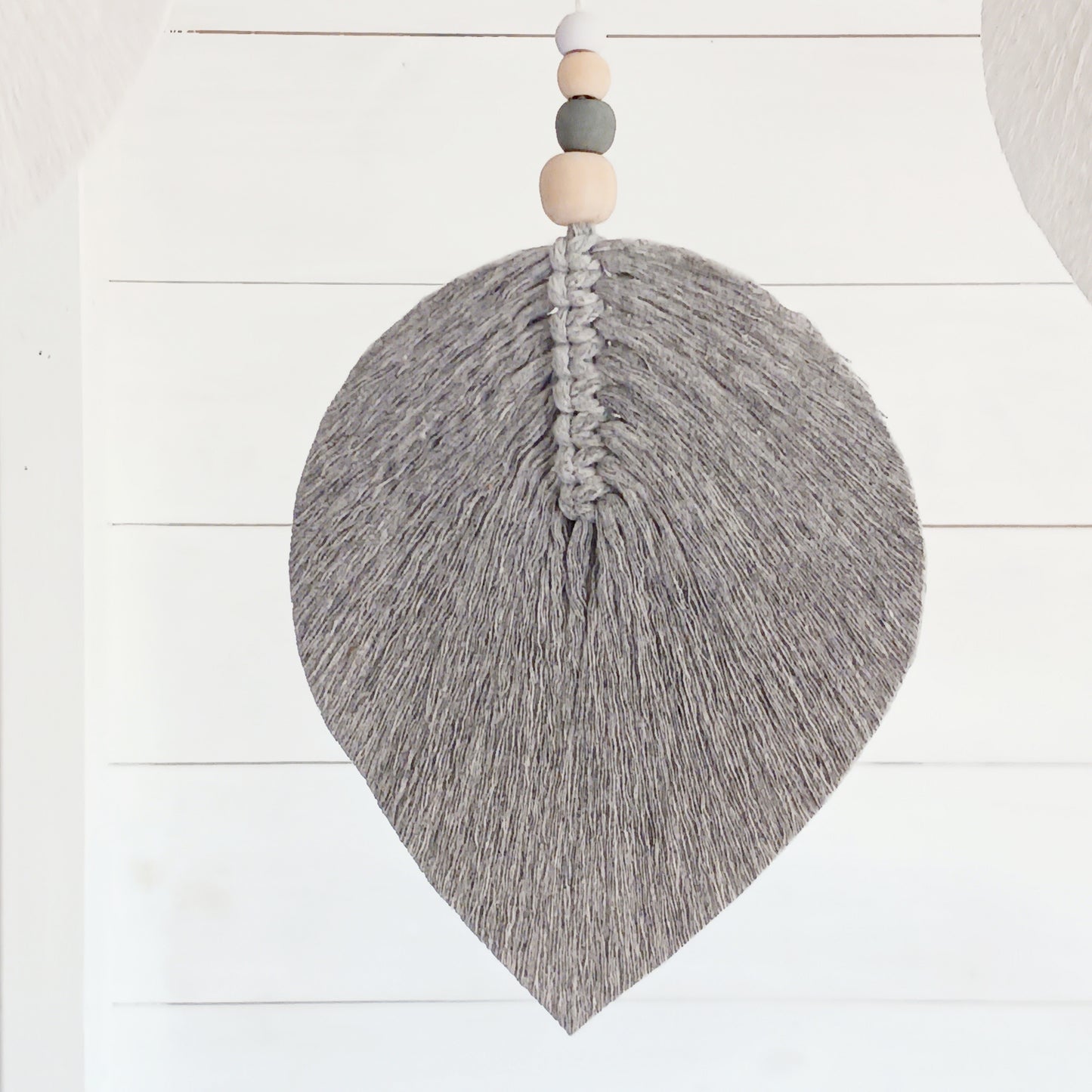 Bring peace, balance, and natural elegance into your home with this handmade large brown Elemental Spirits Dream Catcher. Crafted with love and care on the spiritually blessed island of Bali, this vegan-friendly piece is made entirely from natural materials, free of feathers. Its earthy tones and organic textures create a warm and grounding presence, perfect for bedrooms, meditation spaces, or as a thoughtful gift.