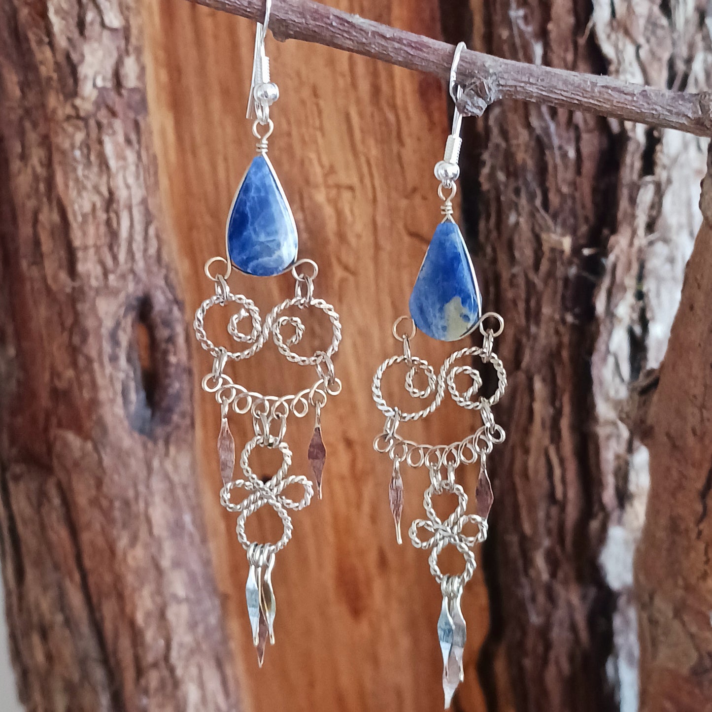 Add a touch of bohemian beauty to your look with these handmade Peruvian stone earrings. Featuring lapis lazuli stones and finished with silver-plated hooks, each pair is carefully crafted in small workshops in Peru.