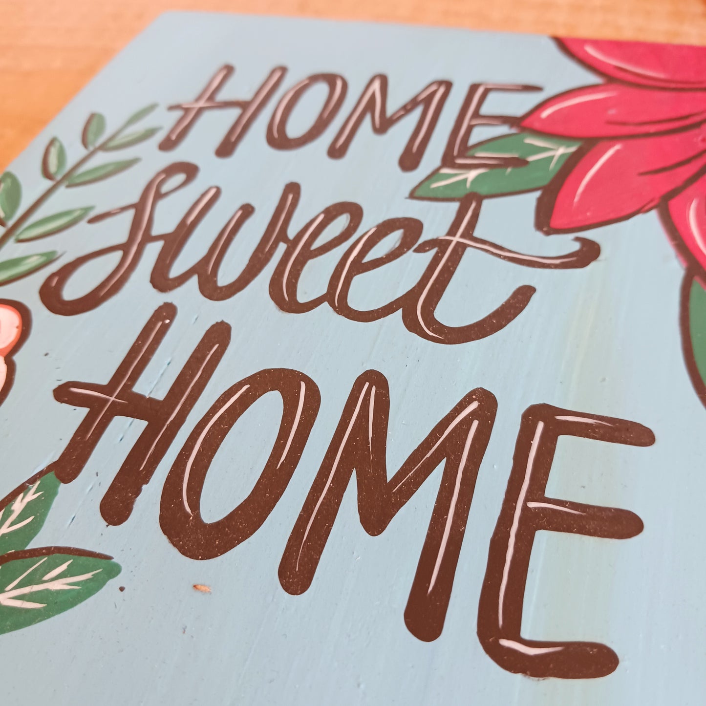 Add warmth and personality to your home with this beautiful Hand Painted Home Sweet Home Wall Plaque. Featuring a vibrant, colourful design and carefully hand-painted finish, this decorative wall plaque is a charming addition to any living room, hallway, kitchen, or entrance.