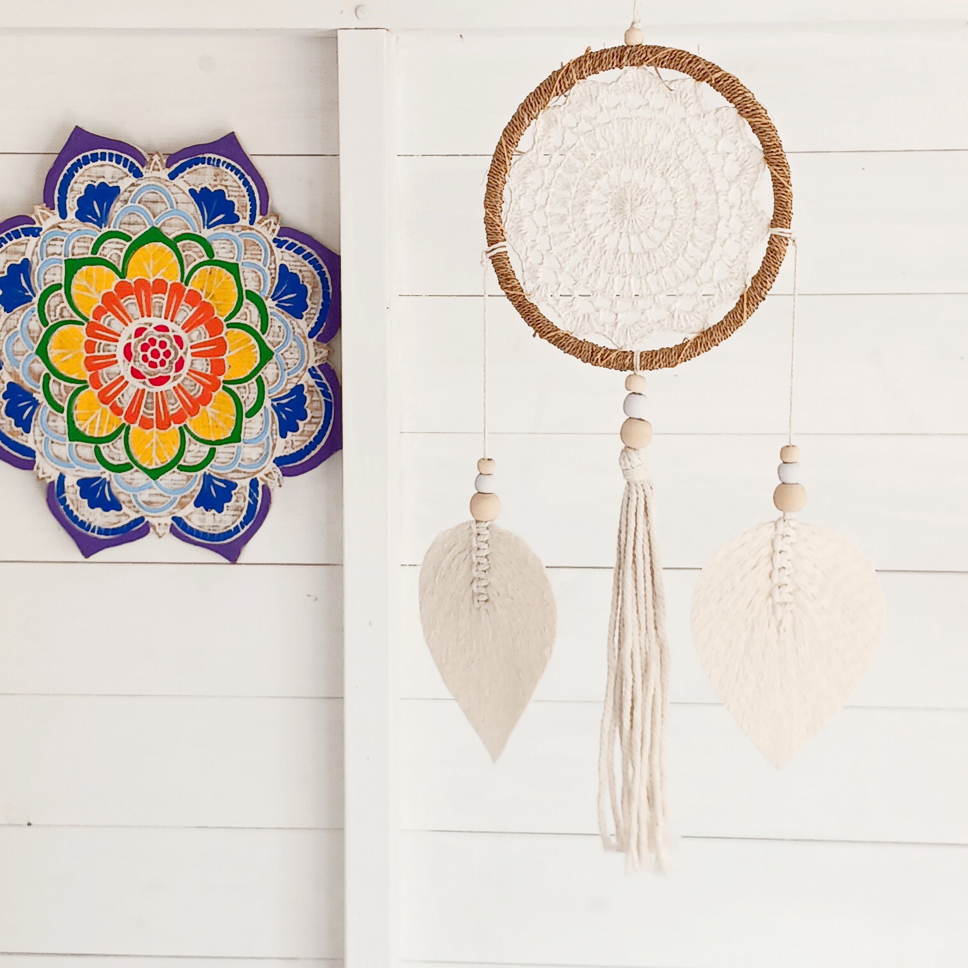 Bring peace, balance, and natural elegance into your home with this handmade Medium Natural Elemental Spirits Dream Catcher. Crafted with love and care on the spiritually blessed island of Bali, this vegan-friendly piece is made entirely from natural materials, free of feathers. Its earthy tones and organic textures create a warm and grounding presence, perfect for bedrooms, meditation spaces, or as a thoughtful gift.